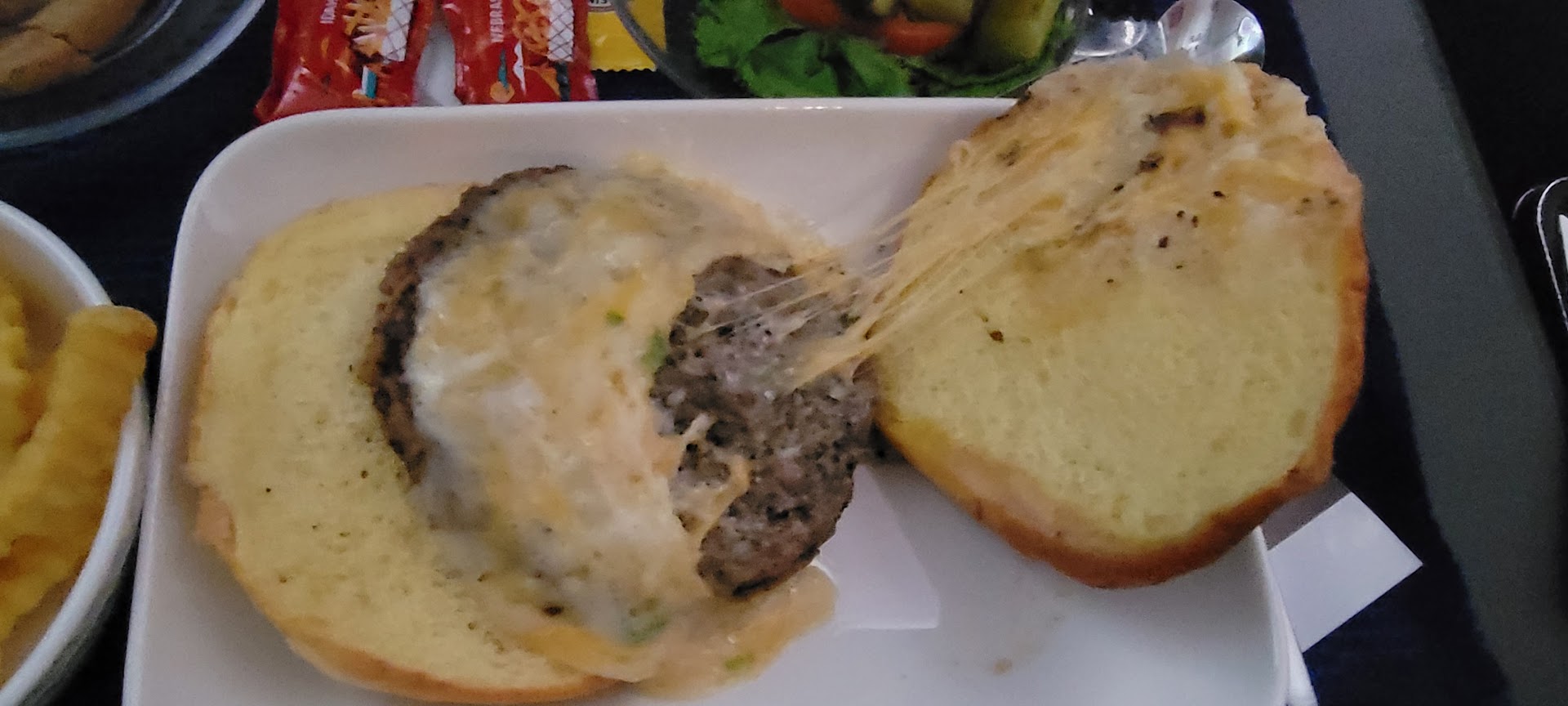 I Tried The New United Airlines Burger & Fries, And It Was Actually