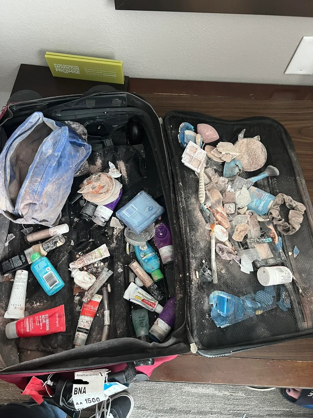 American Airlines Passenger's Luggage Gets Crushed After Being Forced