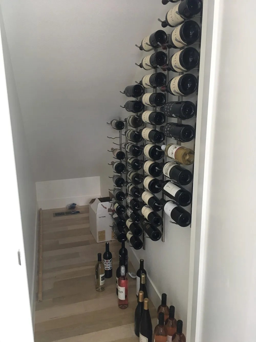 DIY Wine Closet Expanding Capacity Under the Stairs with Metal Wine
