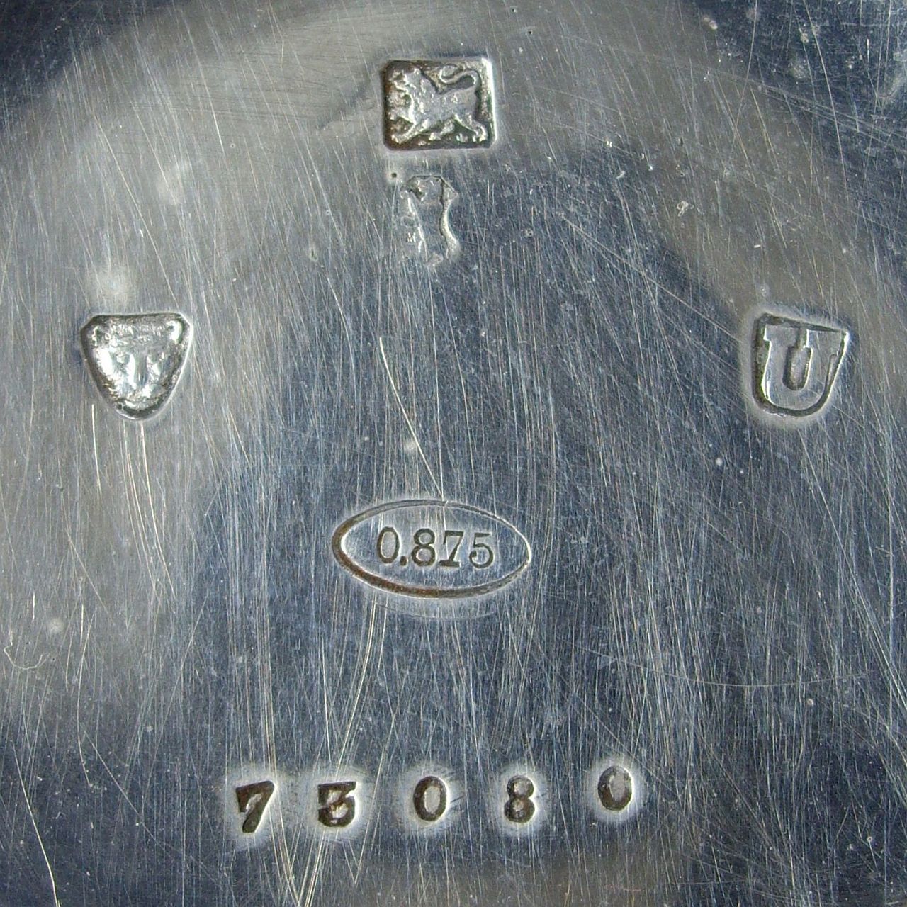 Marks in watch cases hallmarks, sponsor's marks, etc.