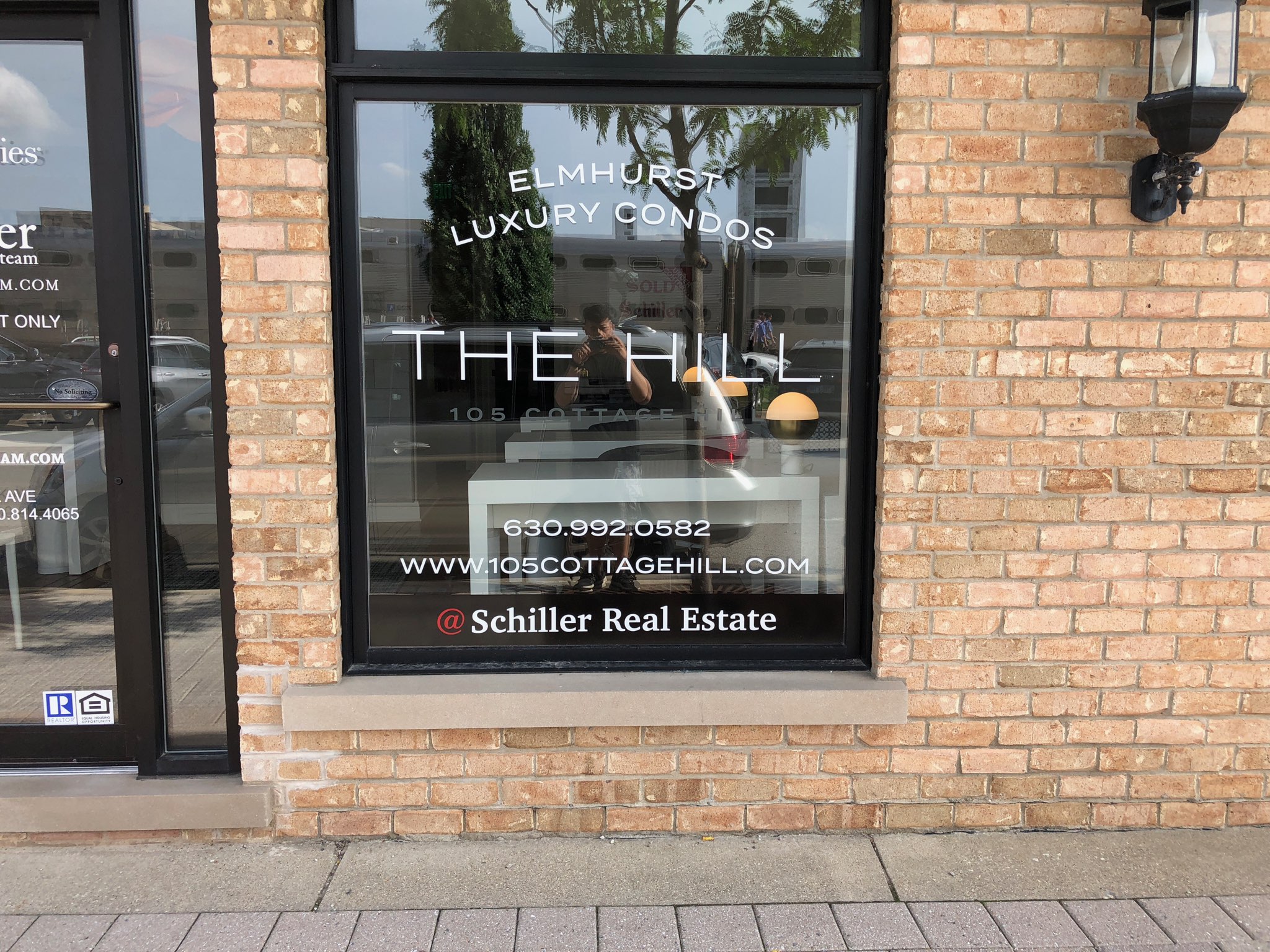 The Schiller Team Adds Vinyl Window Lettering in Elmhurst IL!