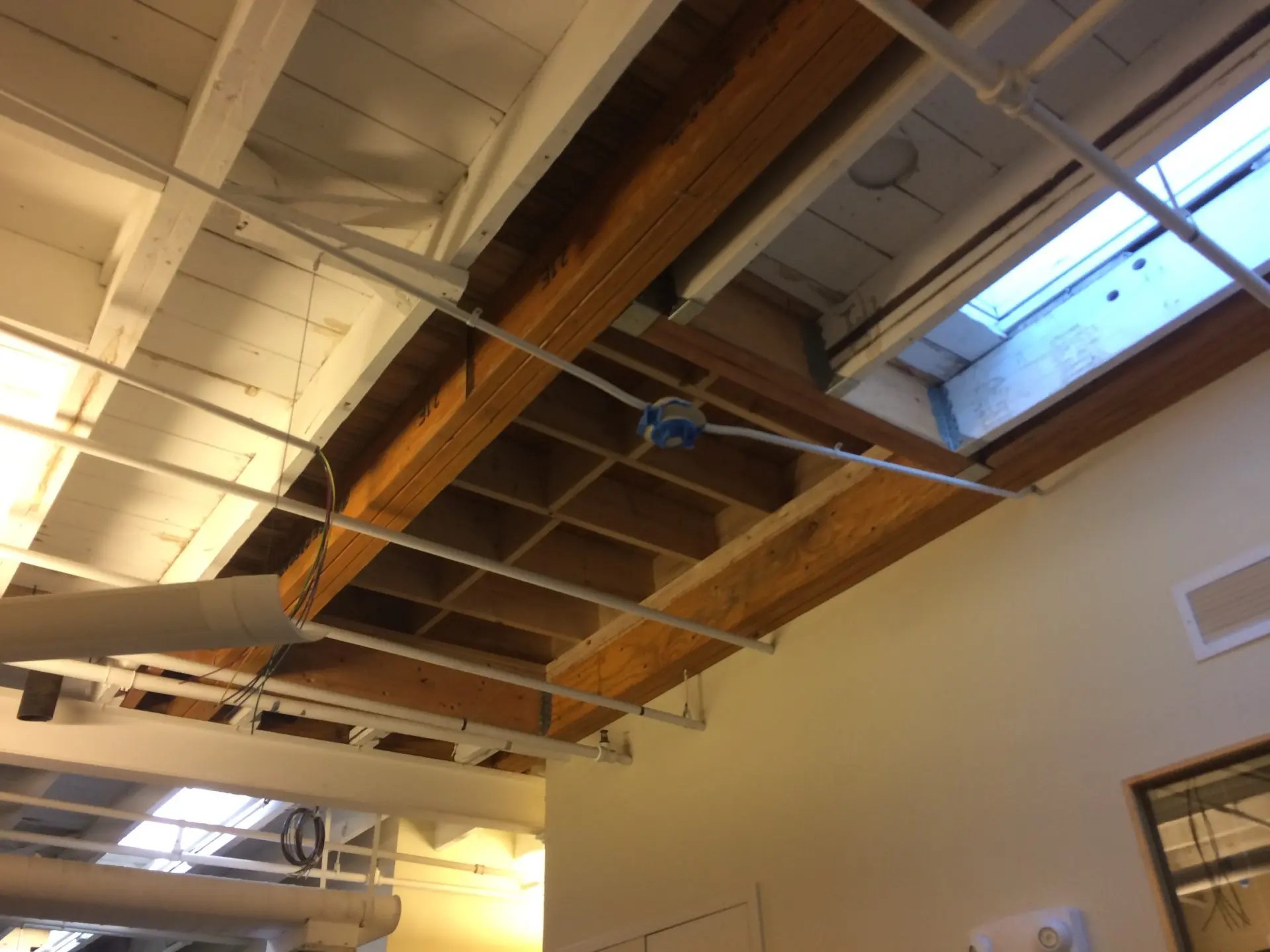 Low Slope Roof Replacement with Structural Roof Framing Modifications