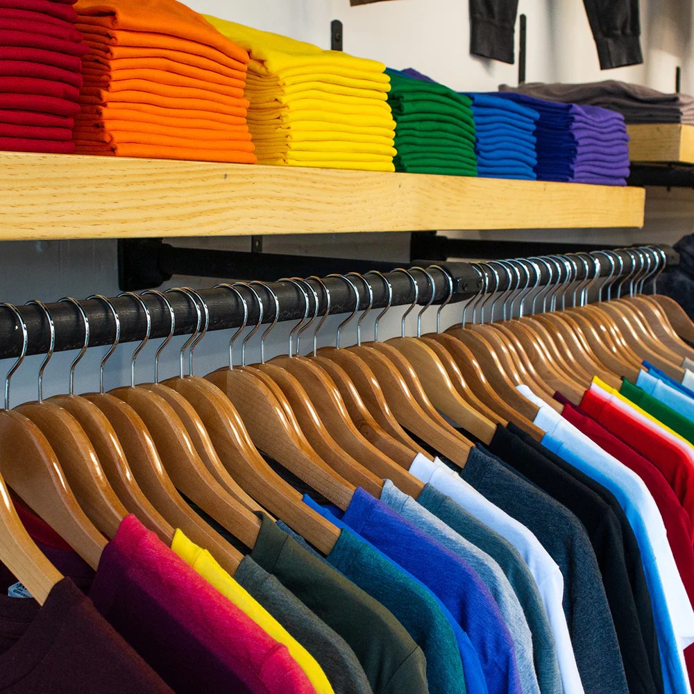 Visit Us V.S. Tees™