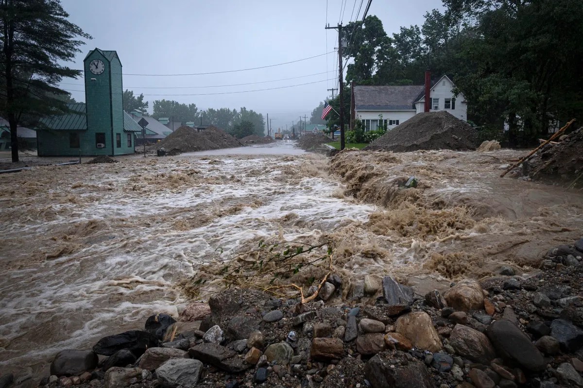 a flooded street in a small town.
