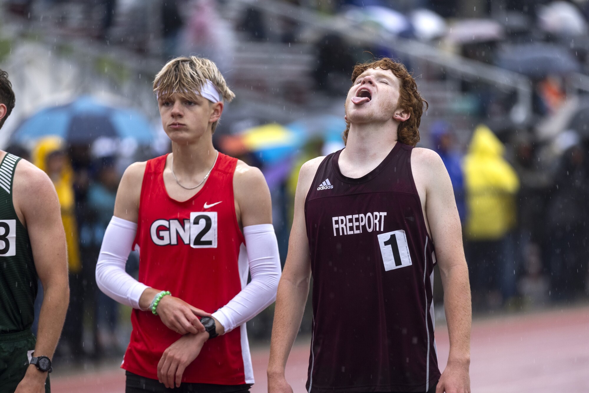 In photos Athletes pour it out at rainy track and field championships