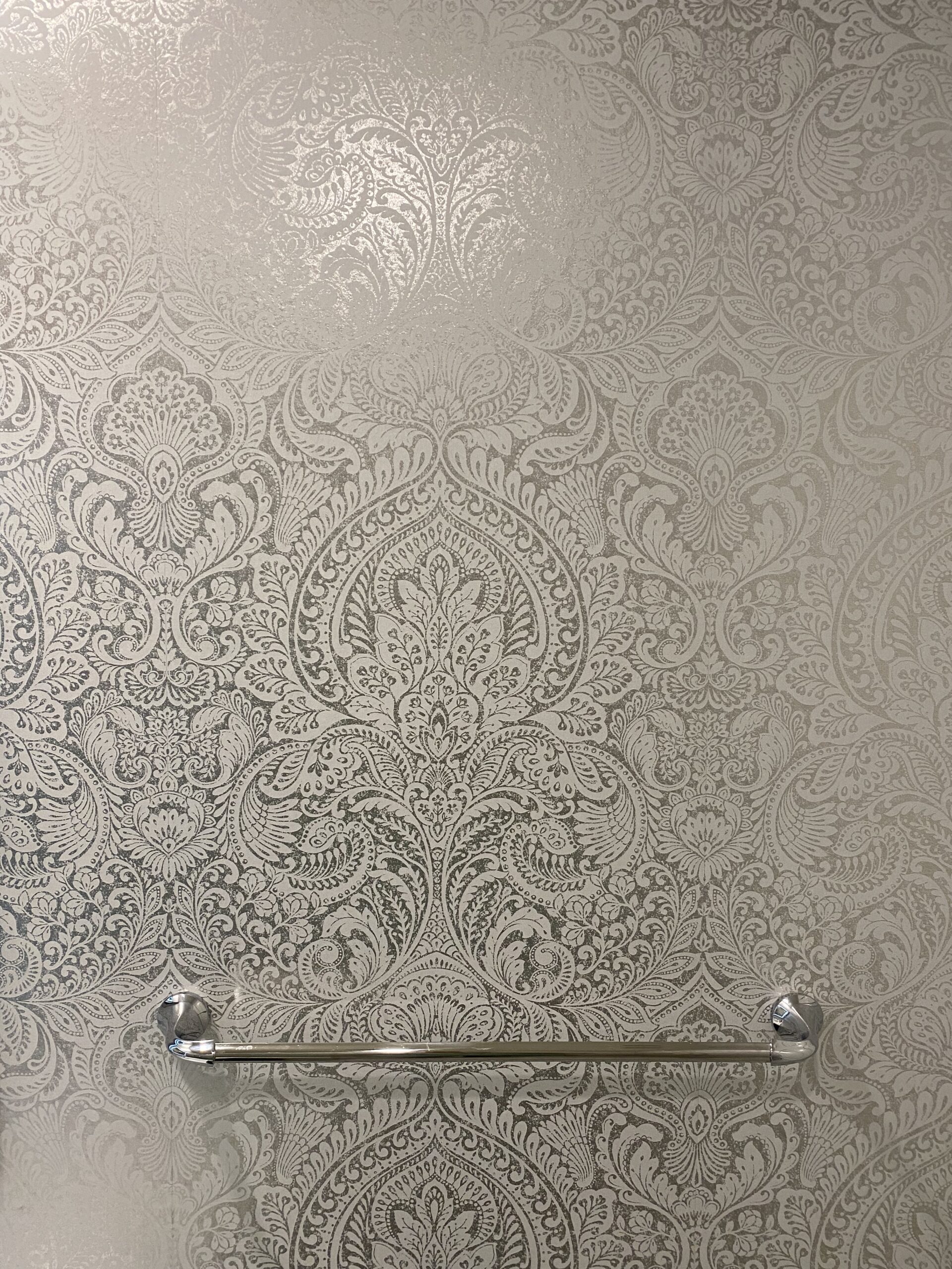Wallpaper installation in a bathroom