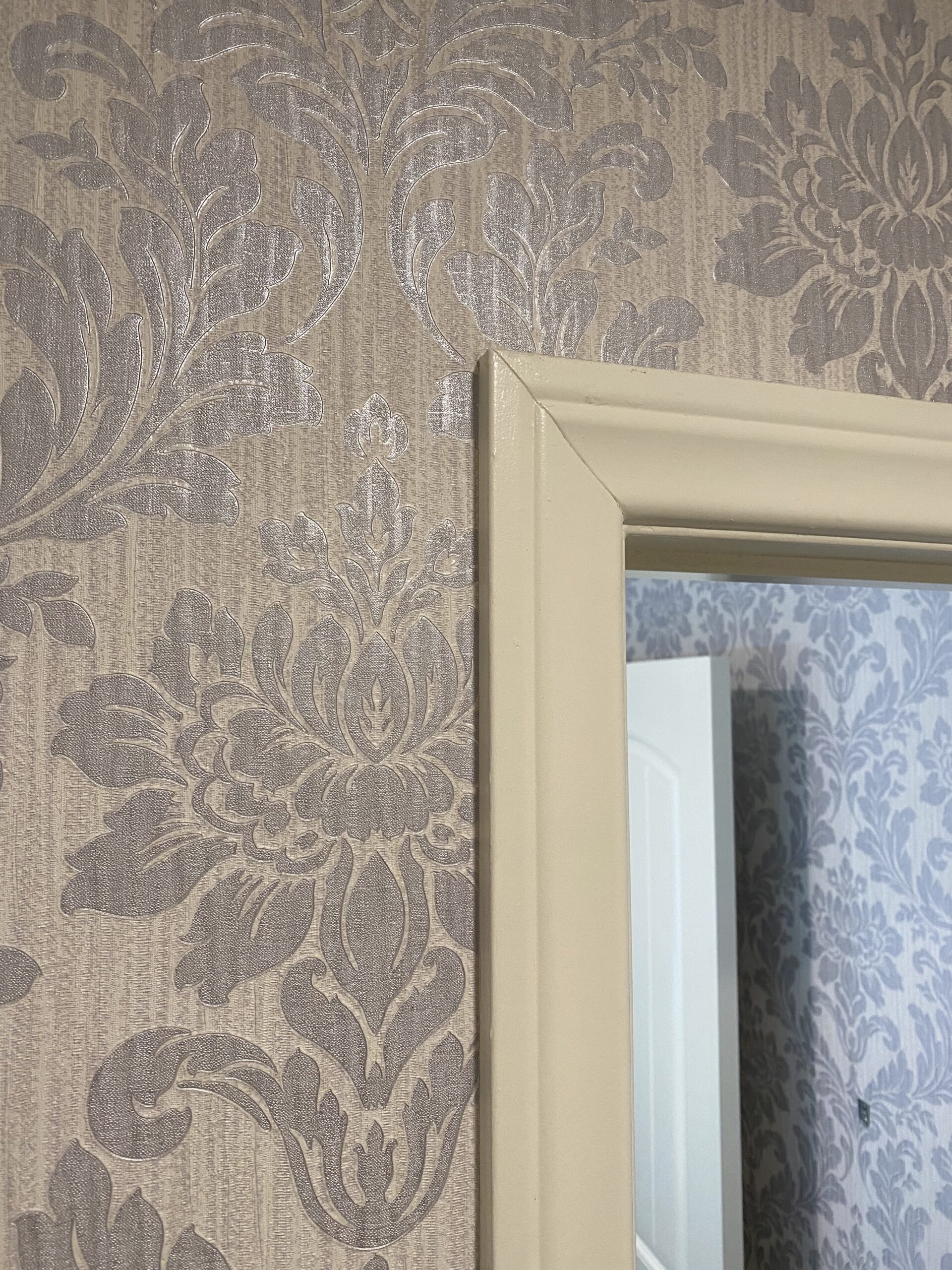 Wallpaper installation in a bathroom