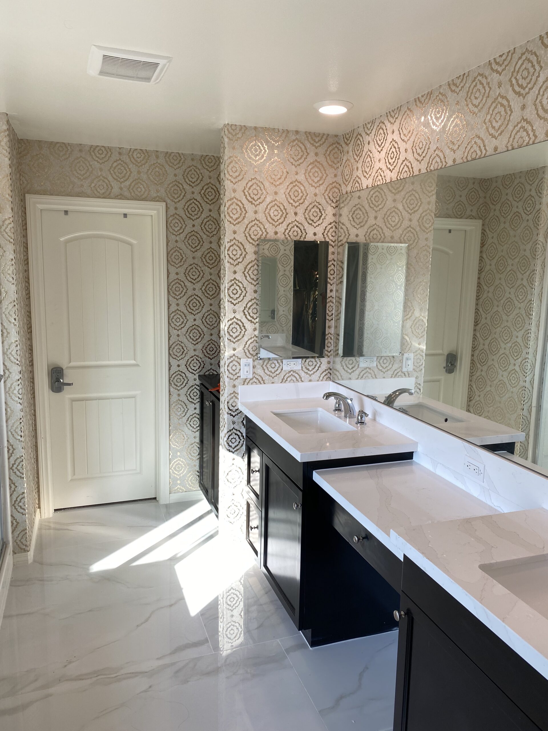 Wallpaper installation in a bathroom