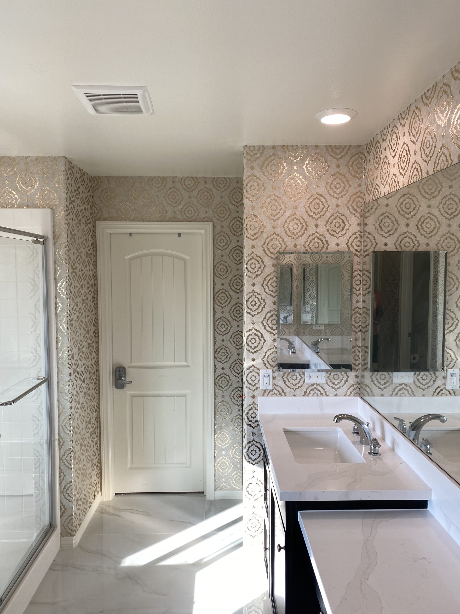 Wallpaper installation in a bathroom