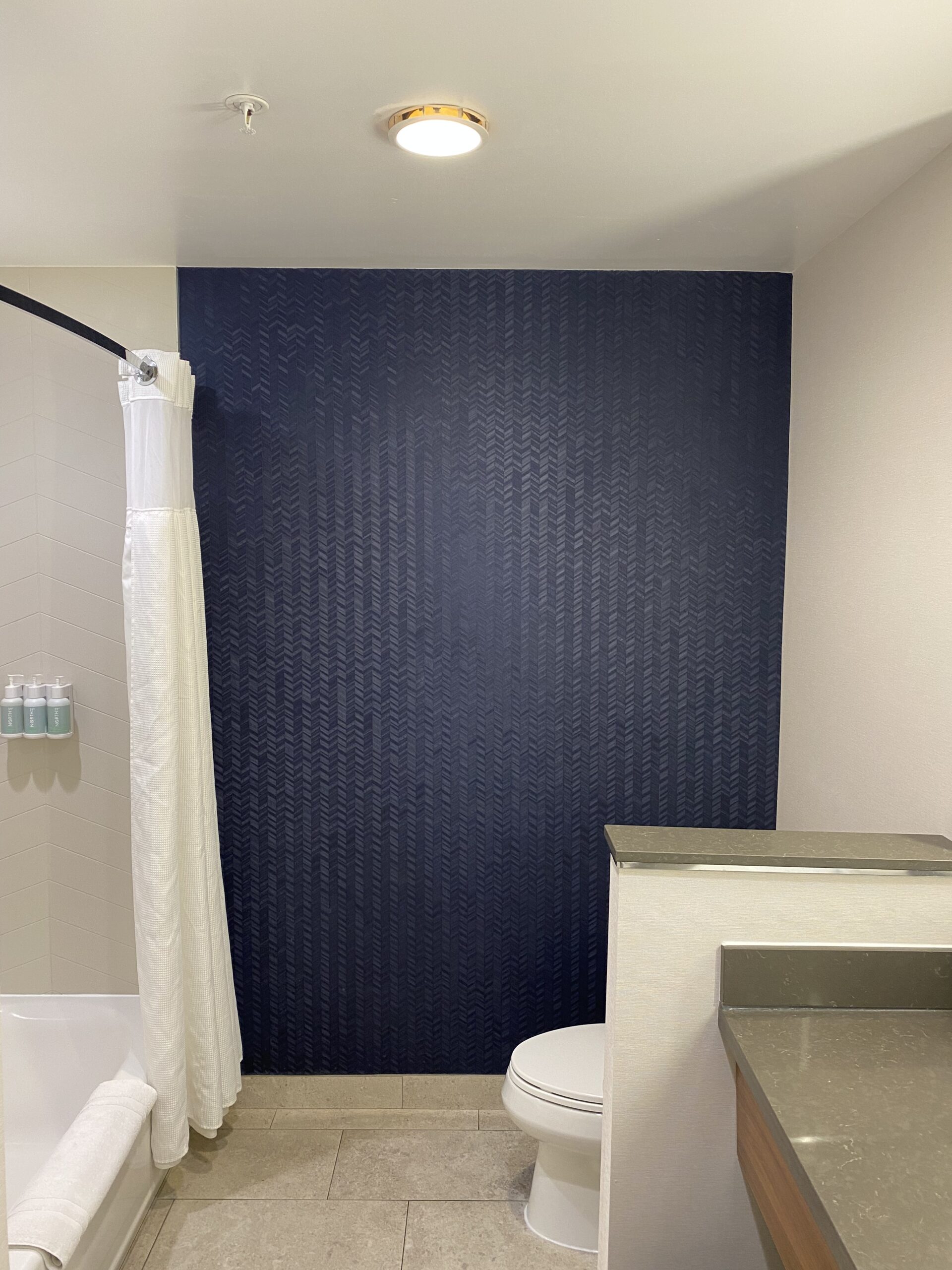 Wallpaper installation in a bathroom