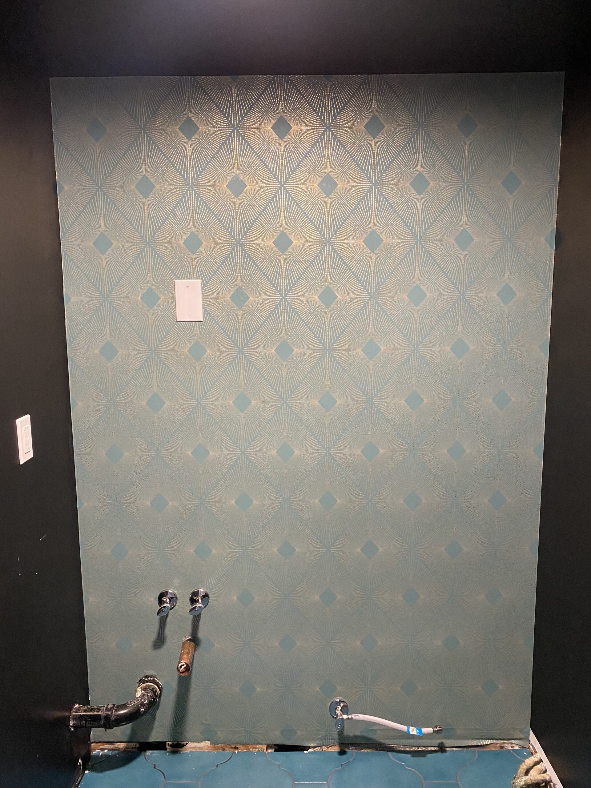 Wallpaper installation in a bathroom