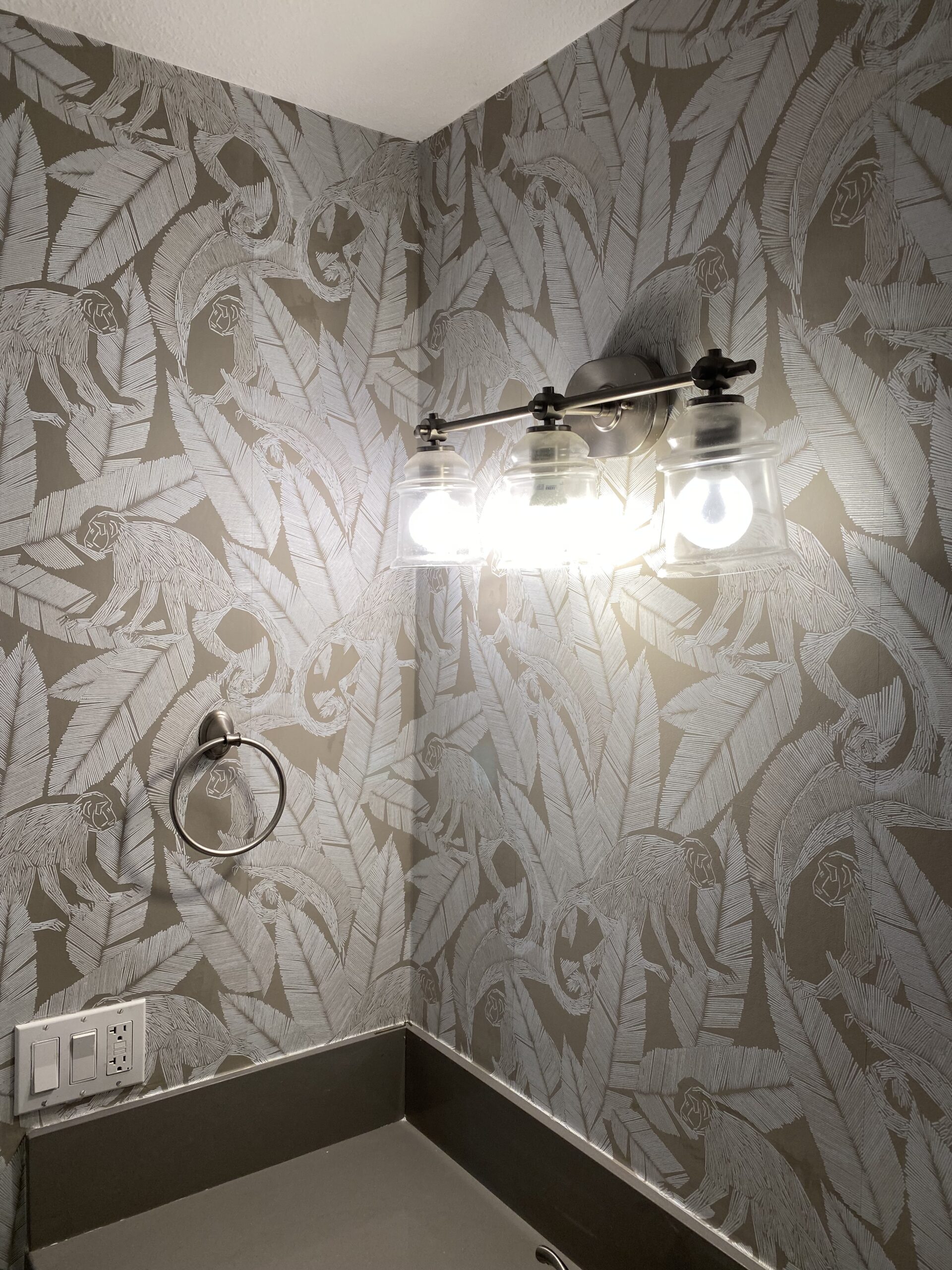 Wallpaper installation in a bathroom
