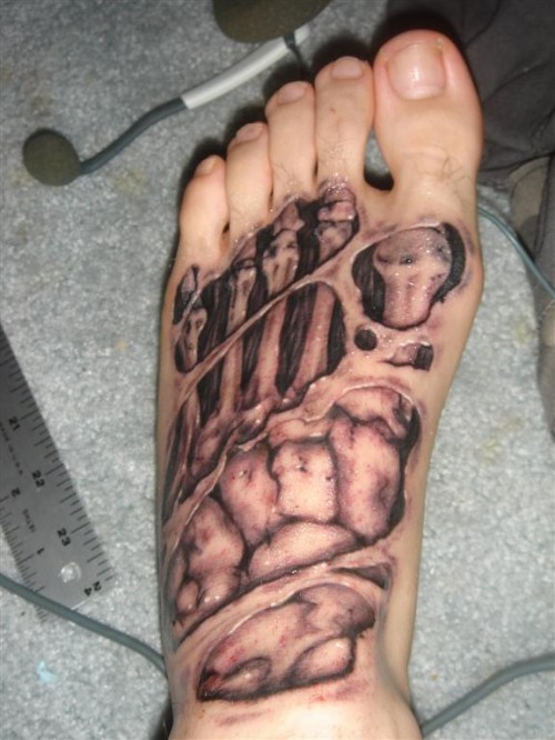 Gory Skeleton Foot Tattoo Looks Painful