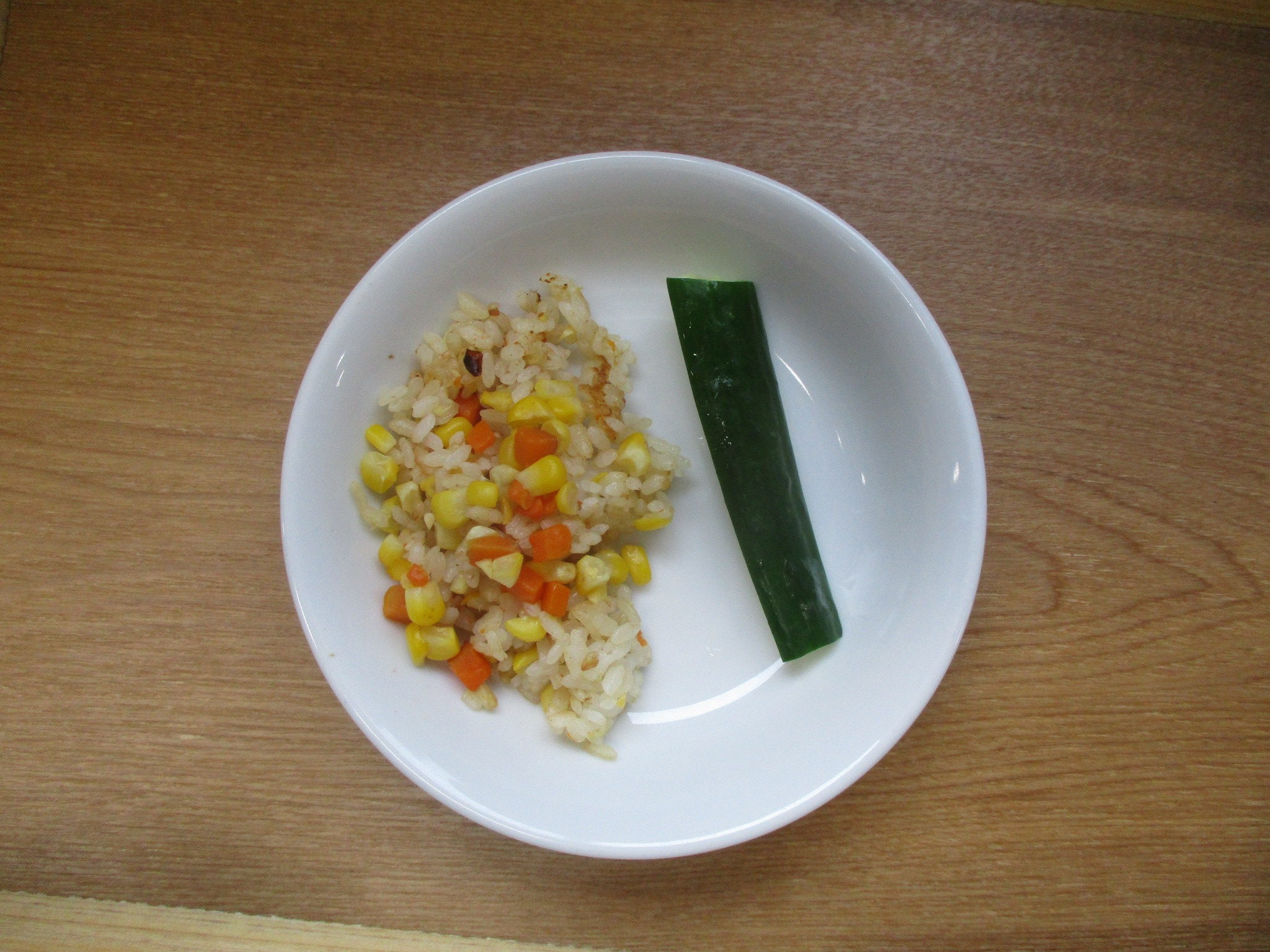 豚肉のにんにく炒め/とうもろこしごはん 社会福祉法人 わらしこの会 わらしこ保育園＆わらしこ第2保育園