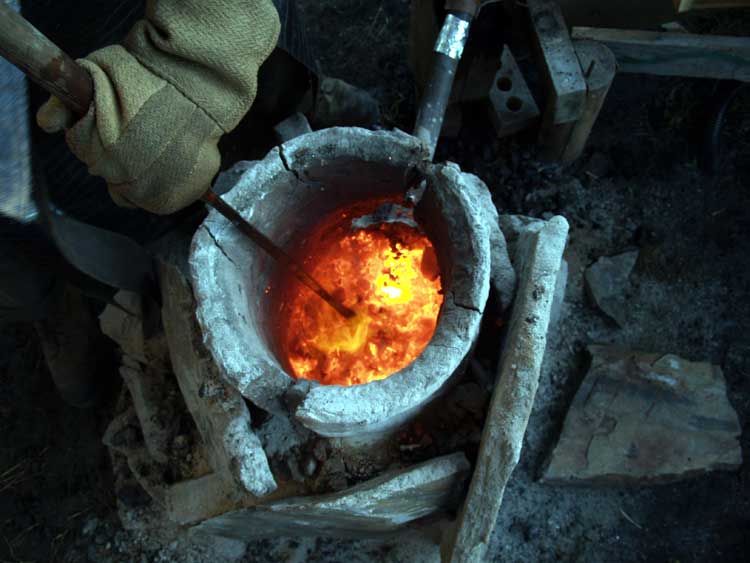 Experimental IRON SMELTING collected documentation for the ongoing series by Darrell Markewitz