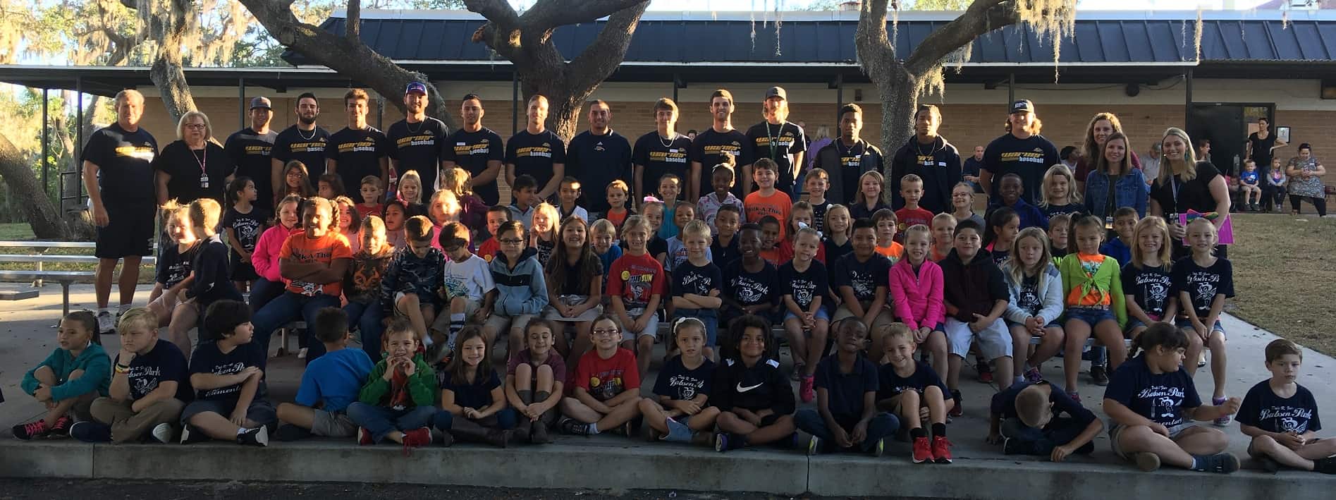 Baseball Team Reads to Elementary Students Warner University