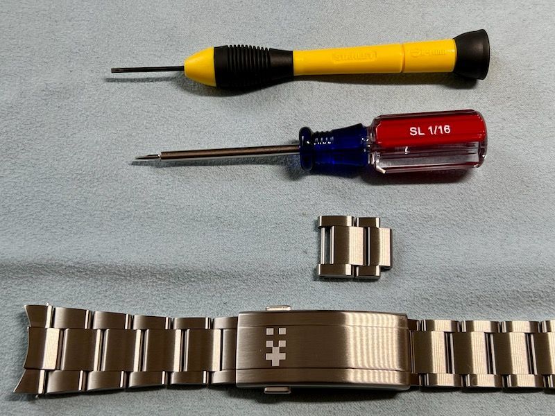 Resizing bracelets with pins and double screws Watch Aficionados