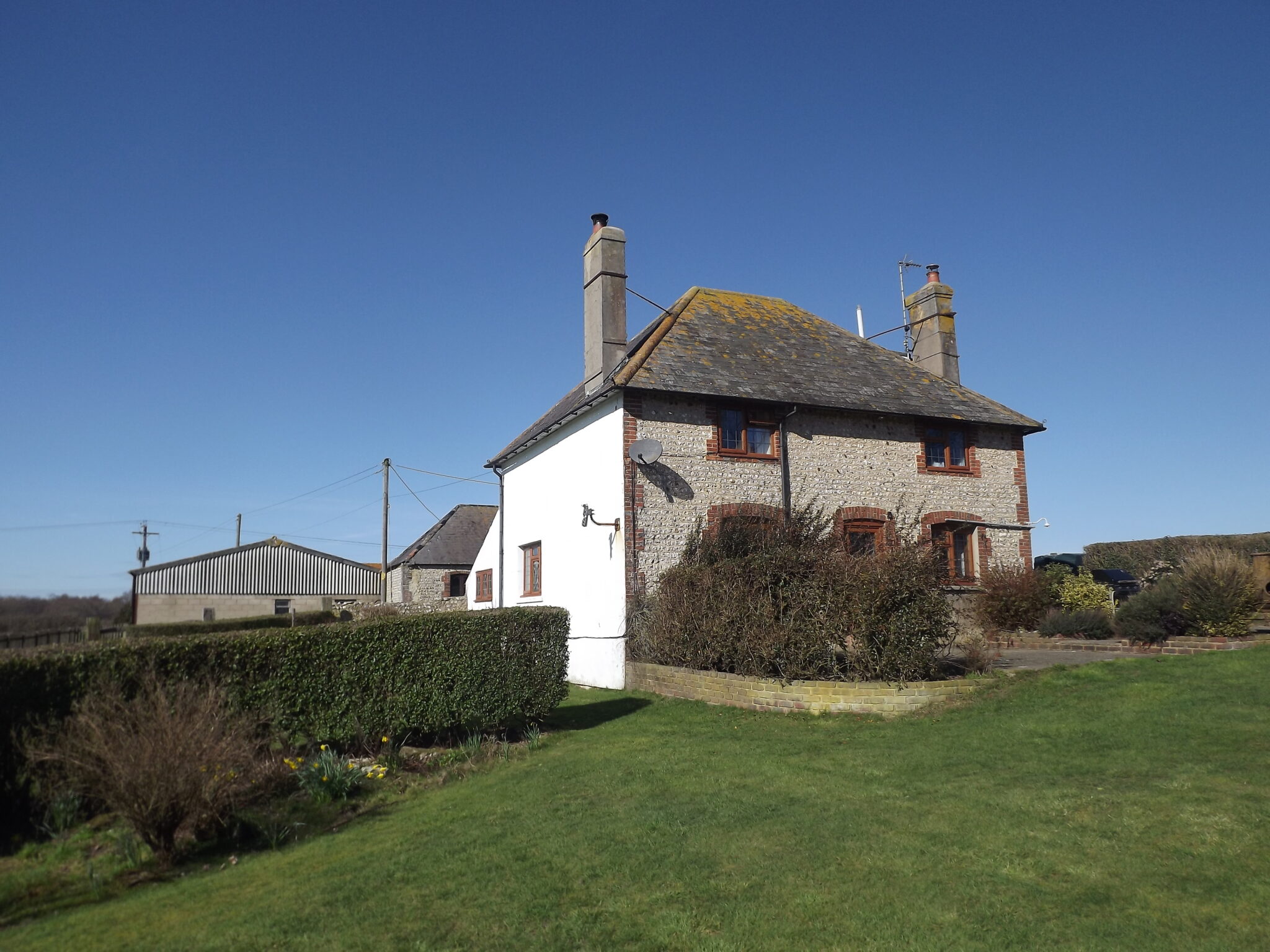 Berwick, East Sussex. Five bedroom farmhouse with development of three