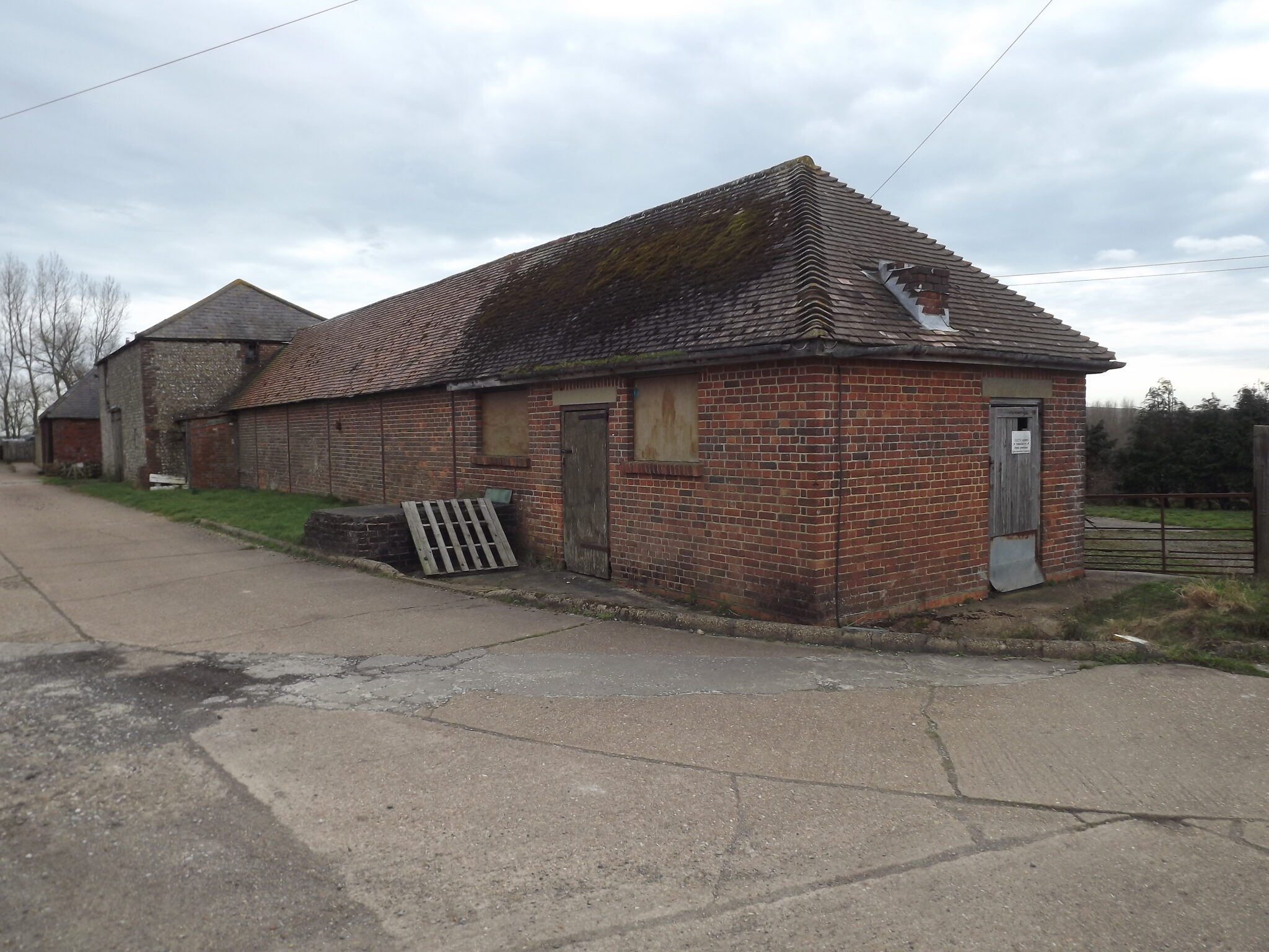 Berwick, East Sussex. Five bedroom farmhouse with development of three