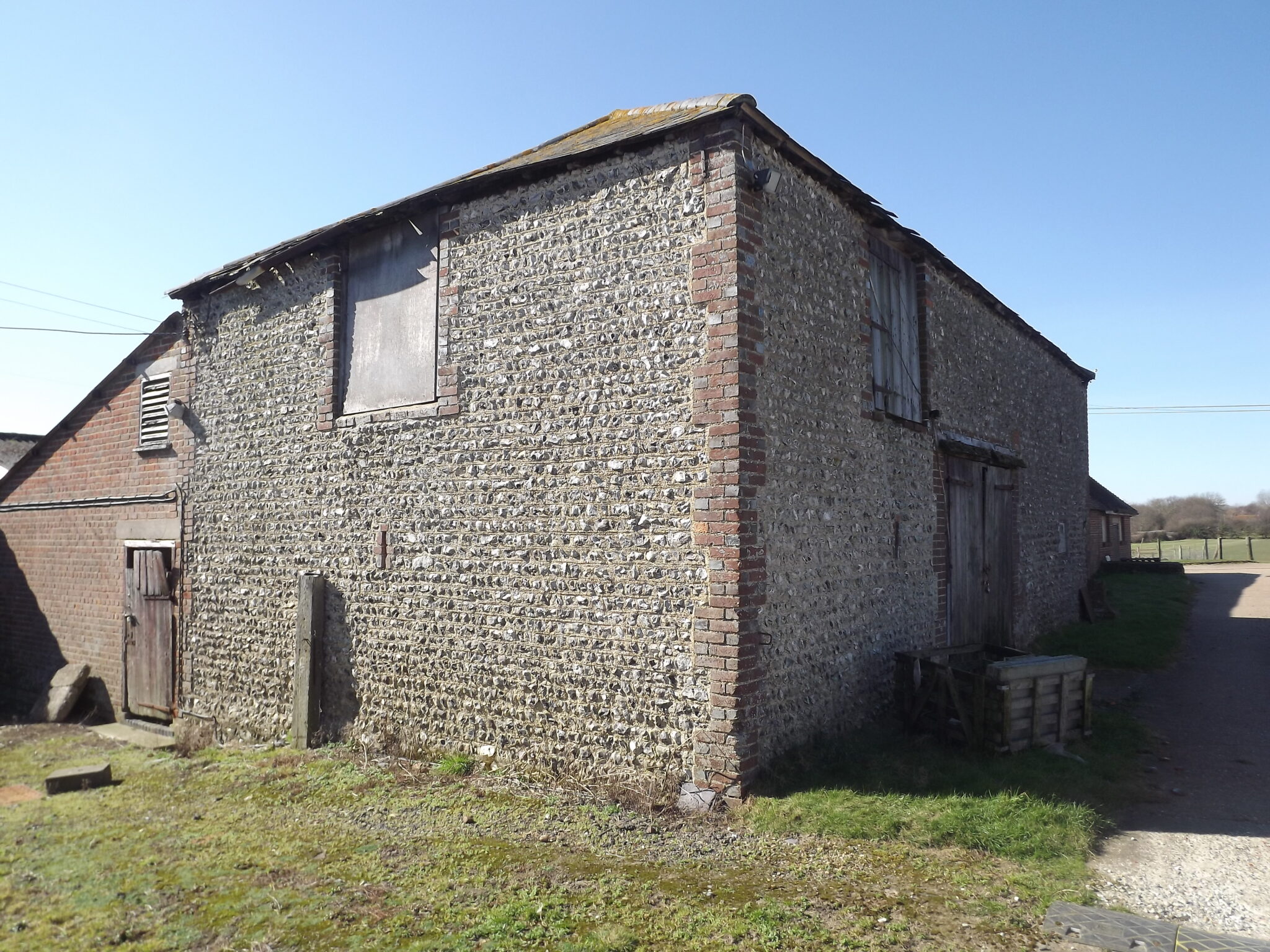 Berwick, East Sussex. Five bedroom farmhouse with development of three