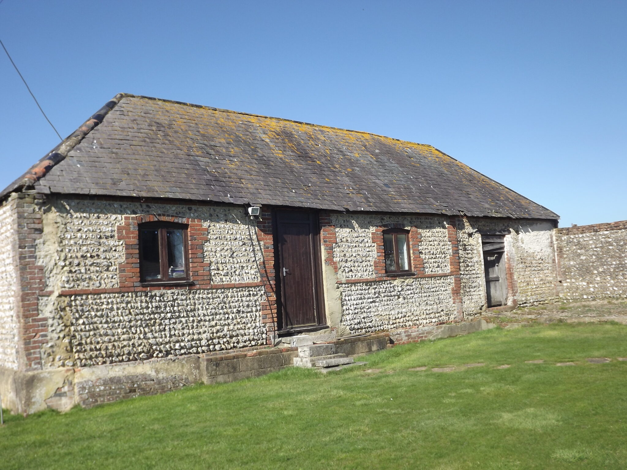 Berwick, East Sussex. Five bedroom farmhouse with development of three