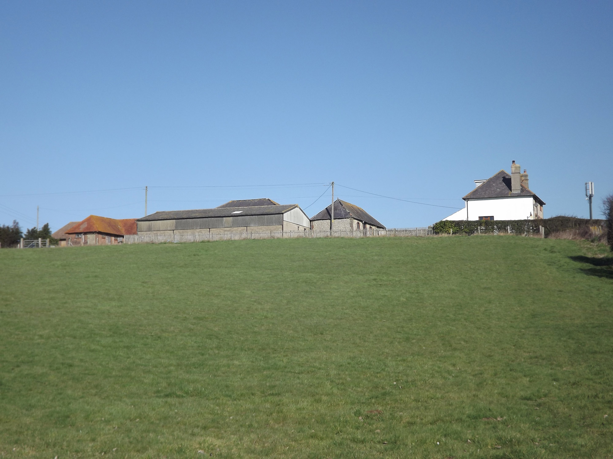 Berwick, East Sussex. Five bedroom farmhouse with development of three
