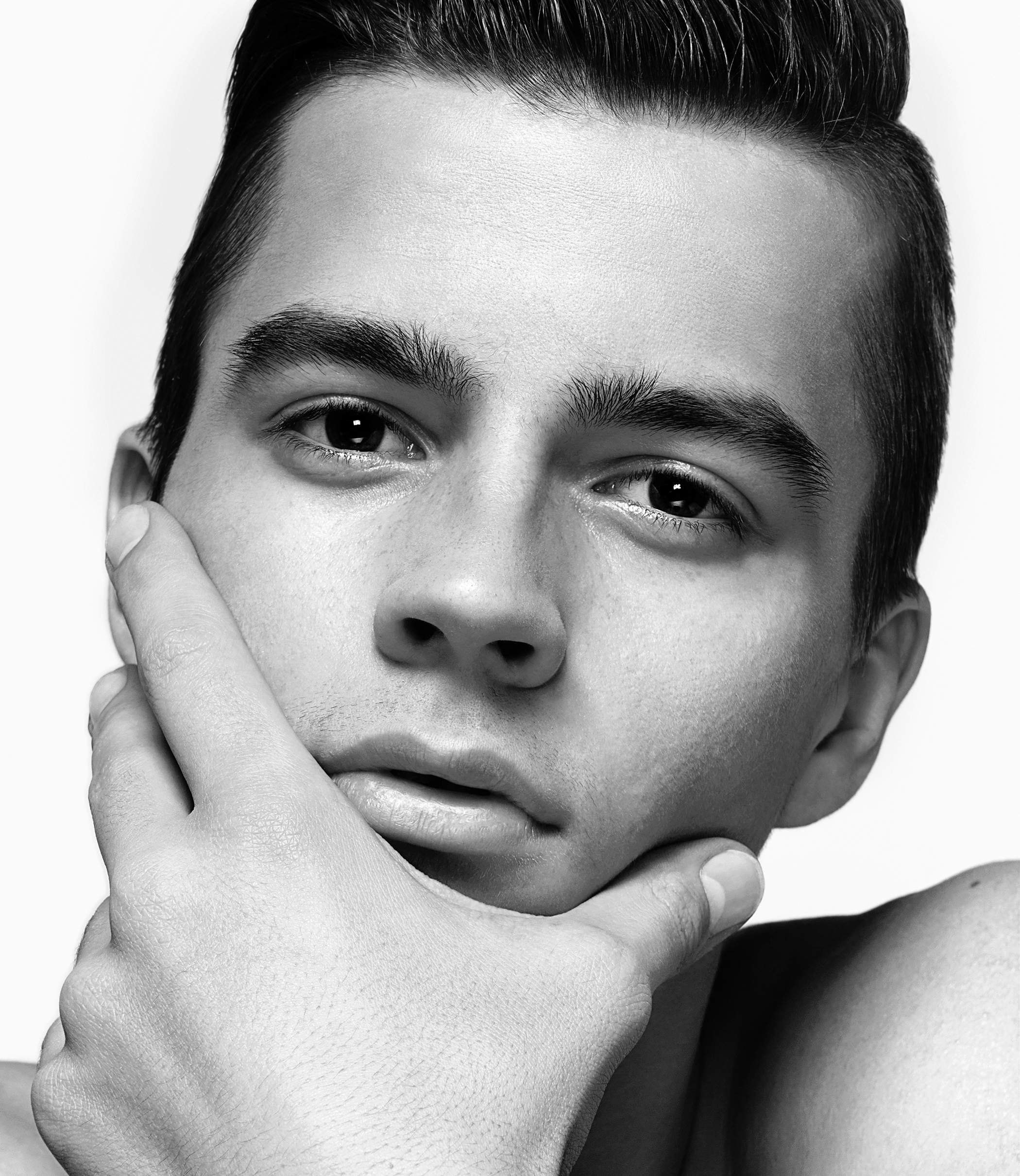 portrait beautiful model closeup of a young man WAXmd
