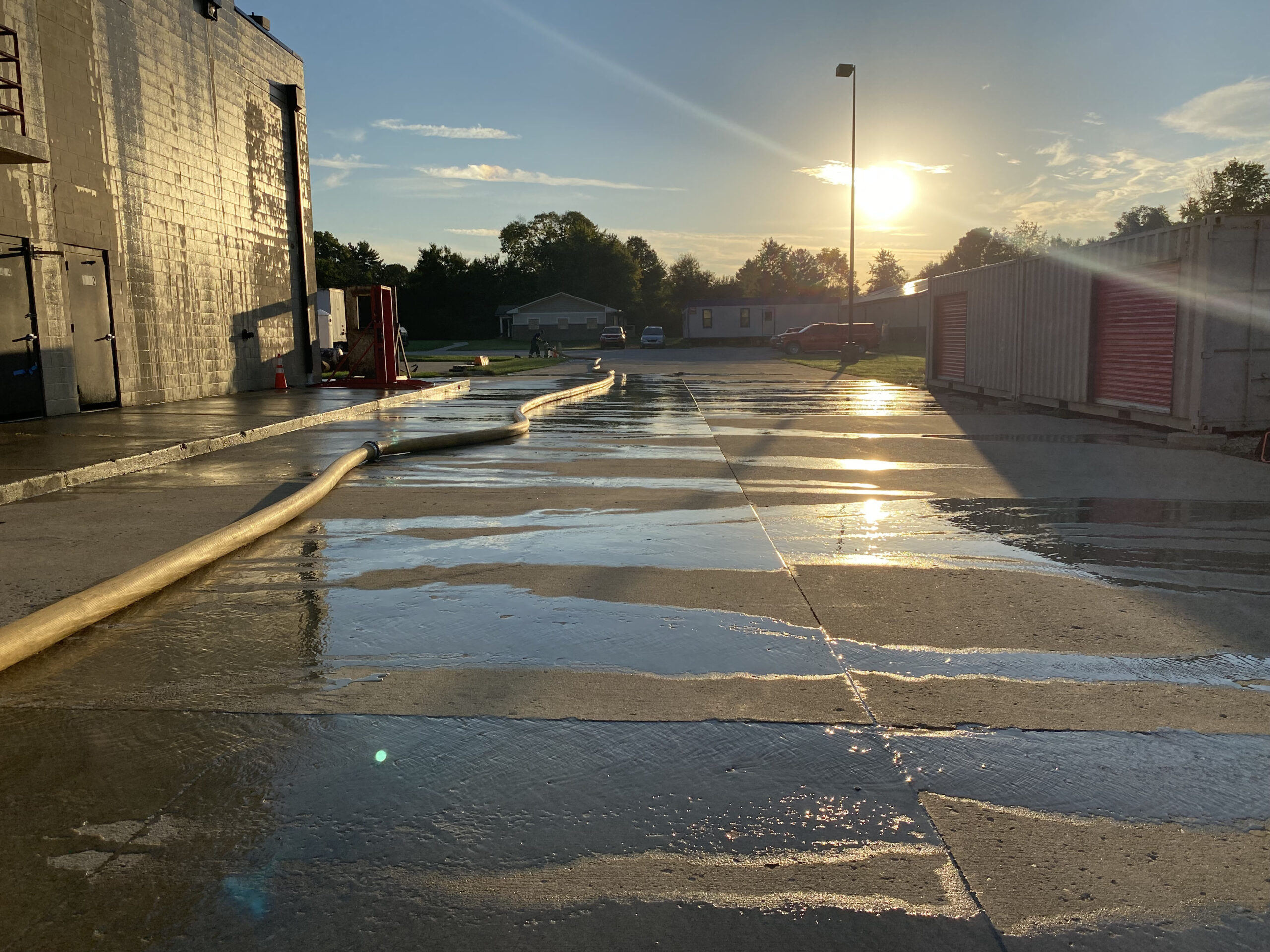 Hose advancement drill. Excellence in Service, Duty and Dedication