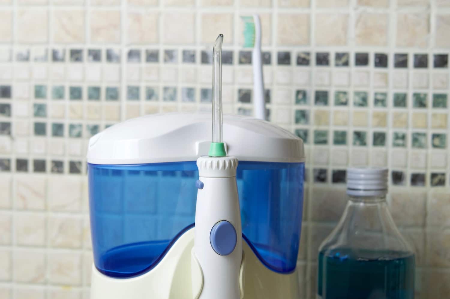 Water Flosser Vs Floss Which Is Better (Pros & Cons)