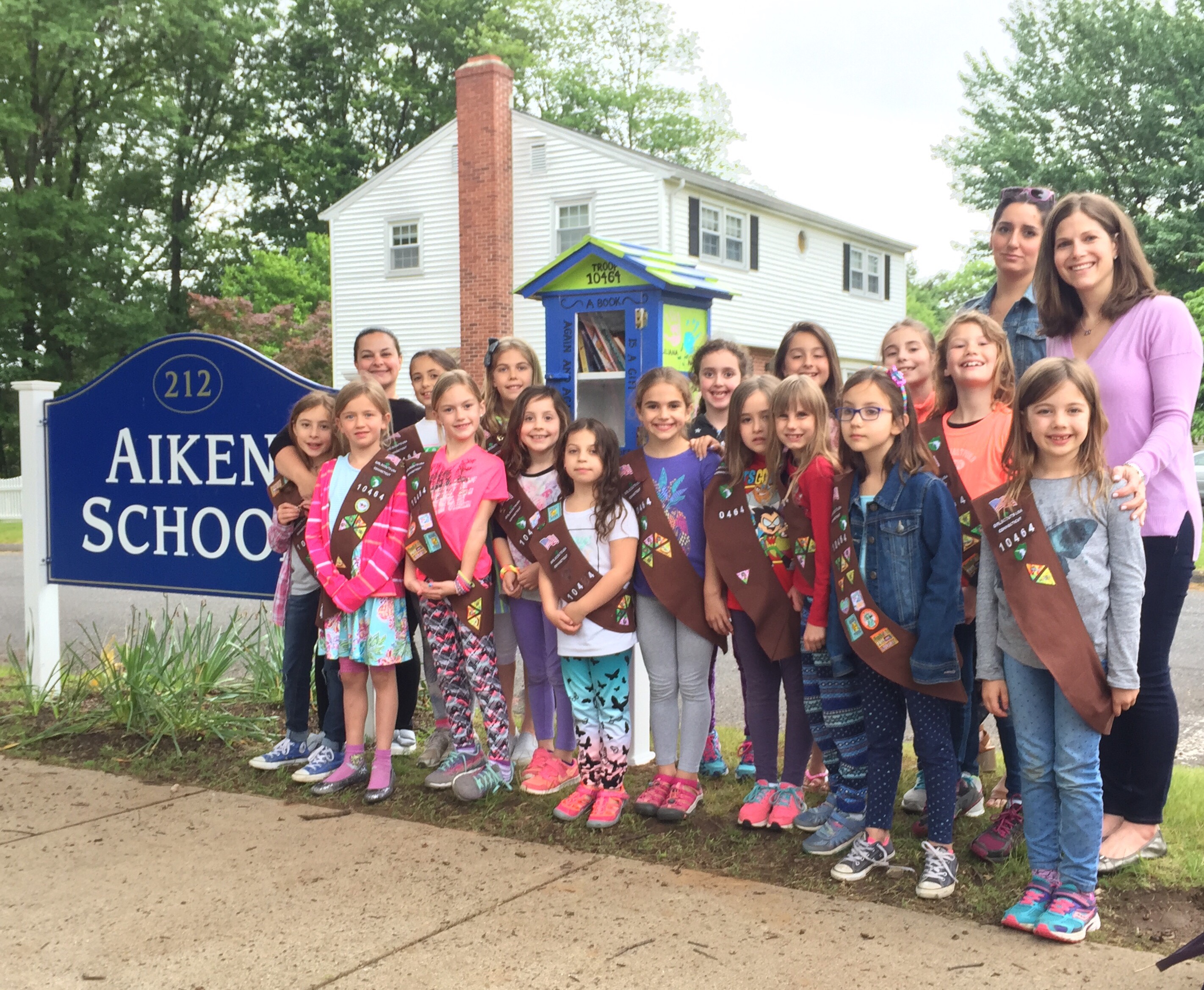 Girl Scout Troop Unveils ‘Little Free Library’ at Aiken Elementary School WeHa West