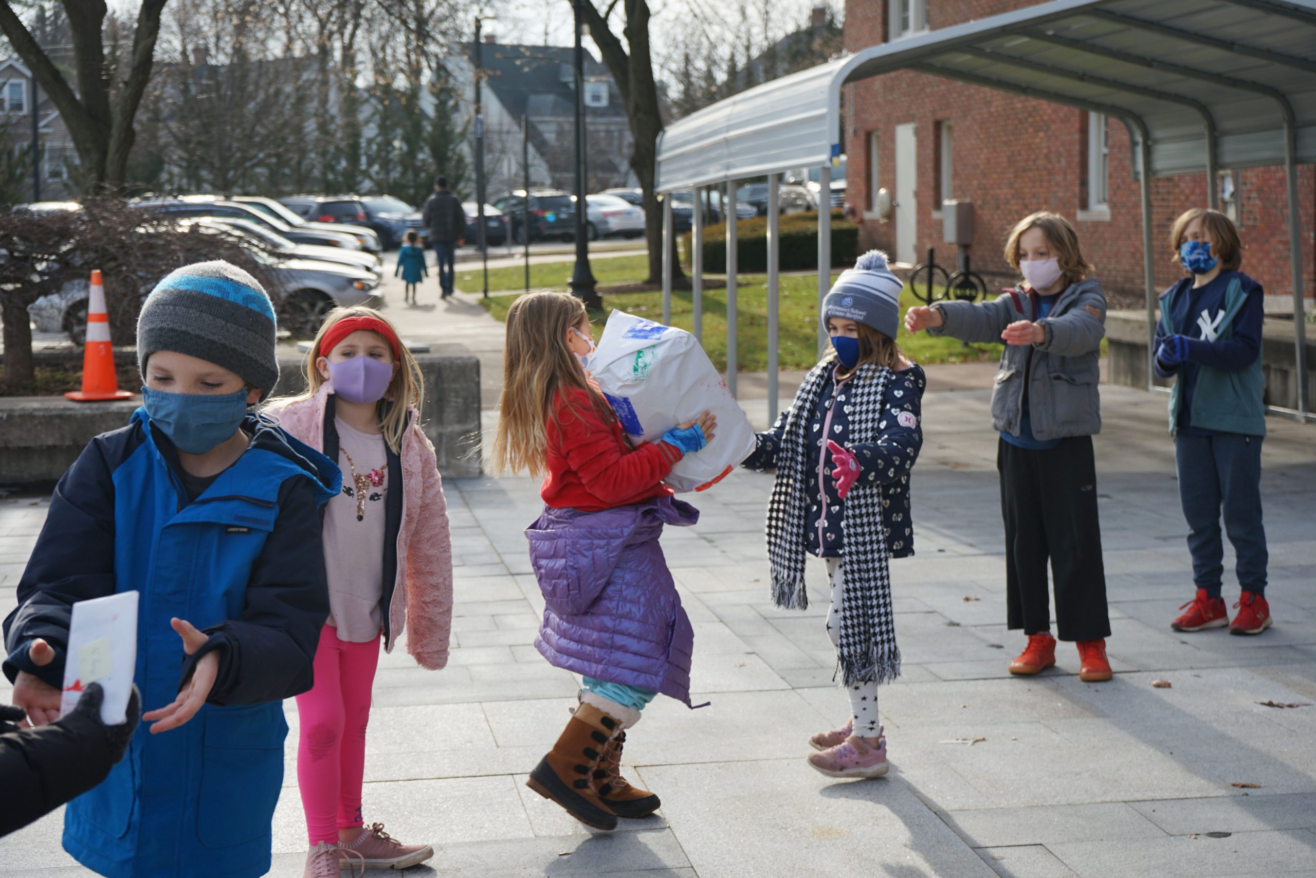 Montessori Students 'Adopt' Two West Hartford Families for the Holidays
