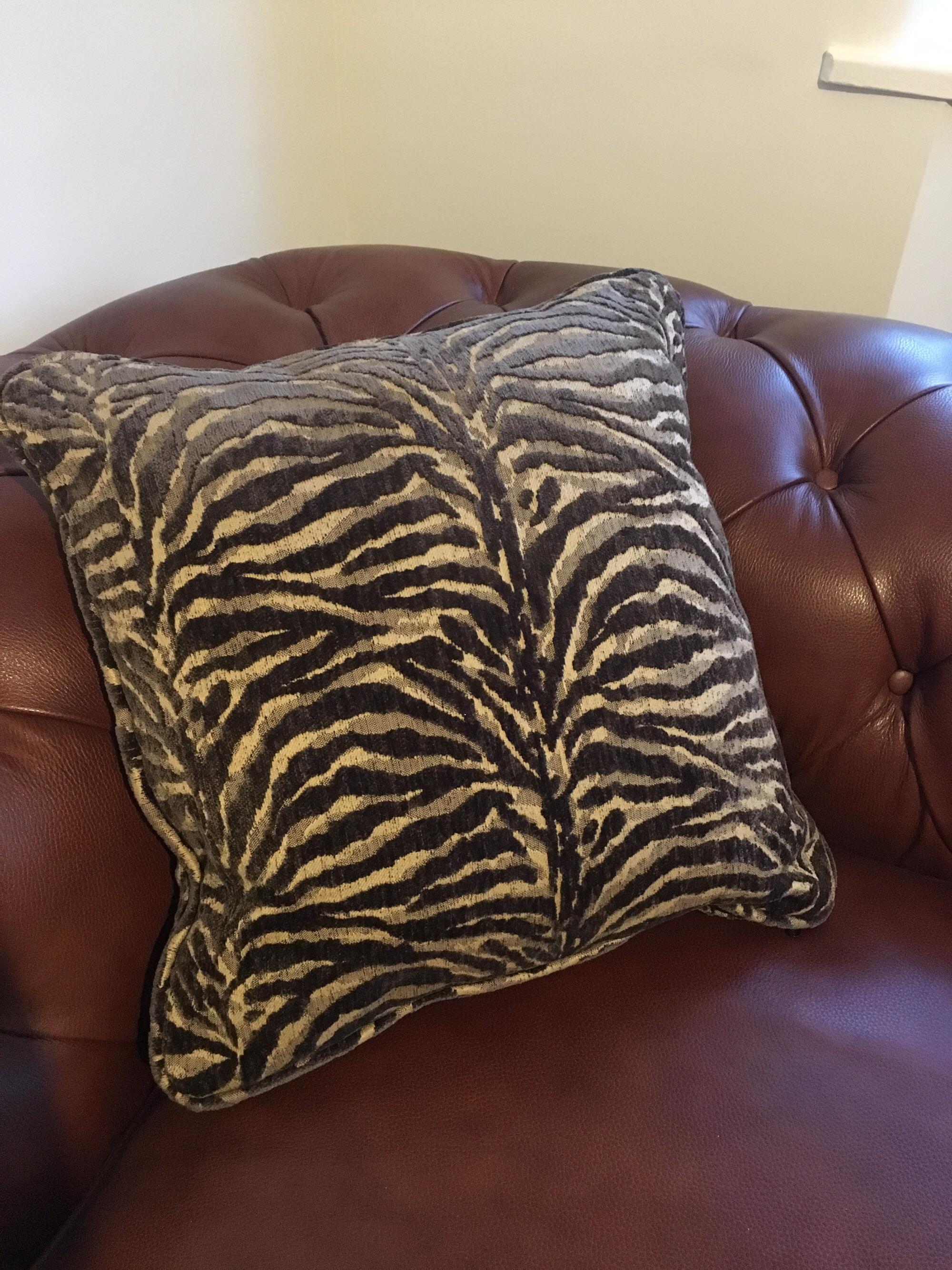 Pair of Sofology Tiger Stripe Cushions in WA10 6AU Denton's Green for £