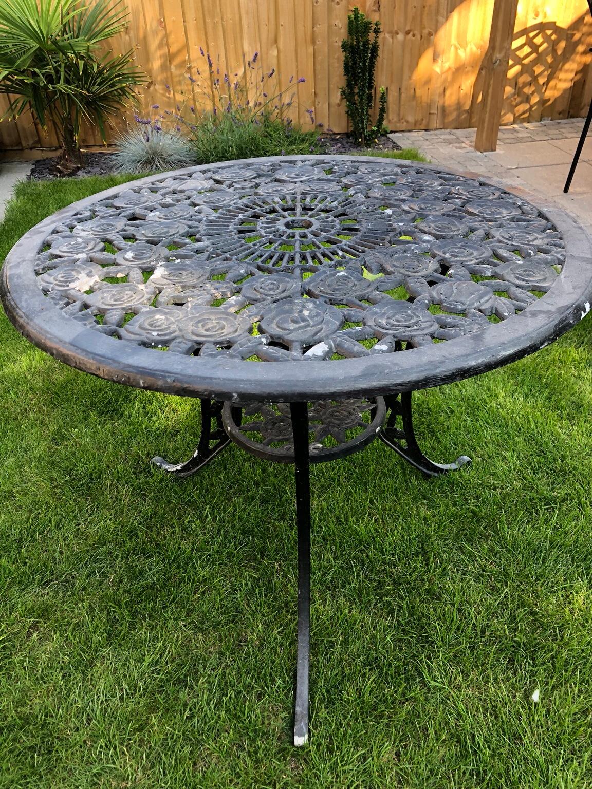 Wrought Iron Garden table and four chairs in WA8 Widnes for £40.00 for