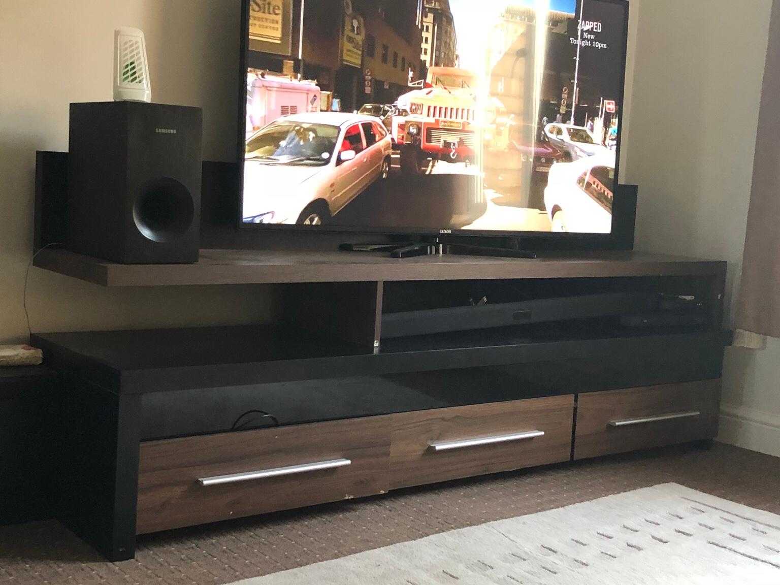 Black and brown 2 piece floating tv unit in RG27 Hart for £50.00 for