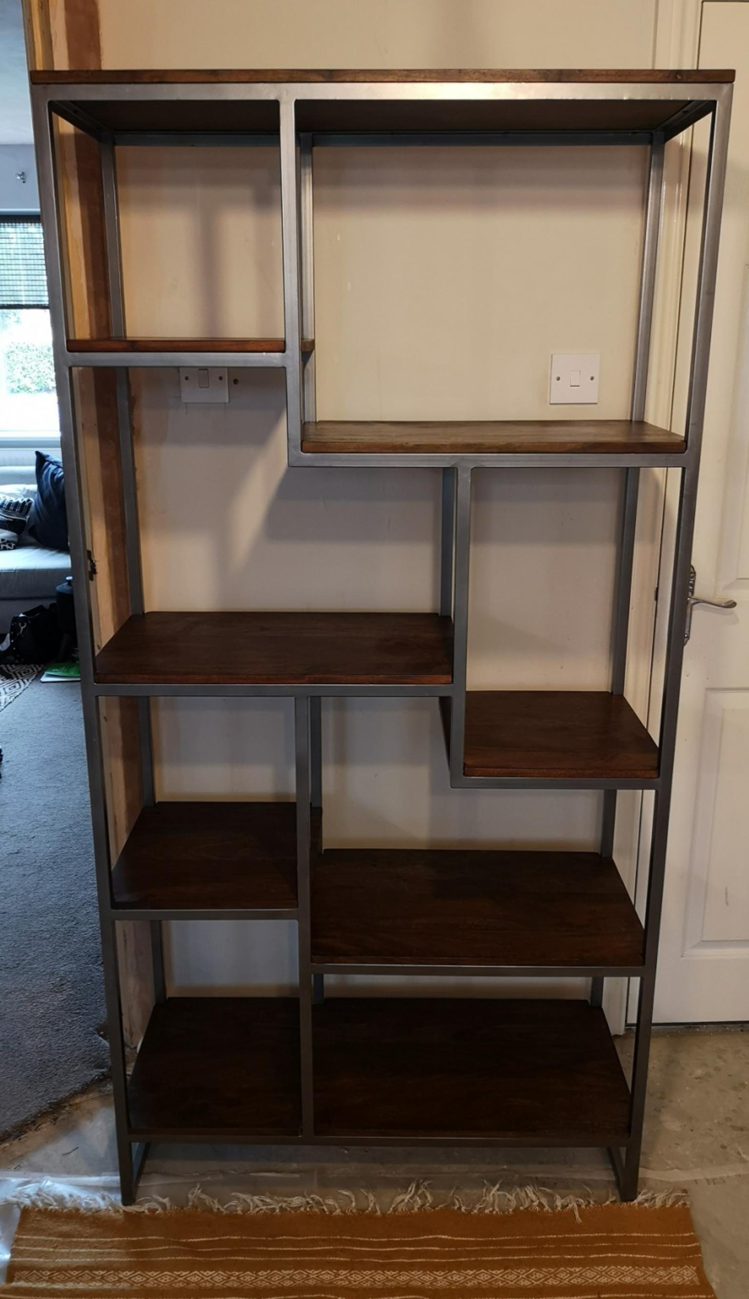 Acacia wood staggered shelving unit cost £400 in BL3 Bolton for £180.00