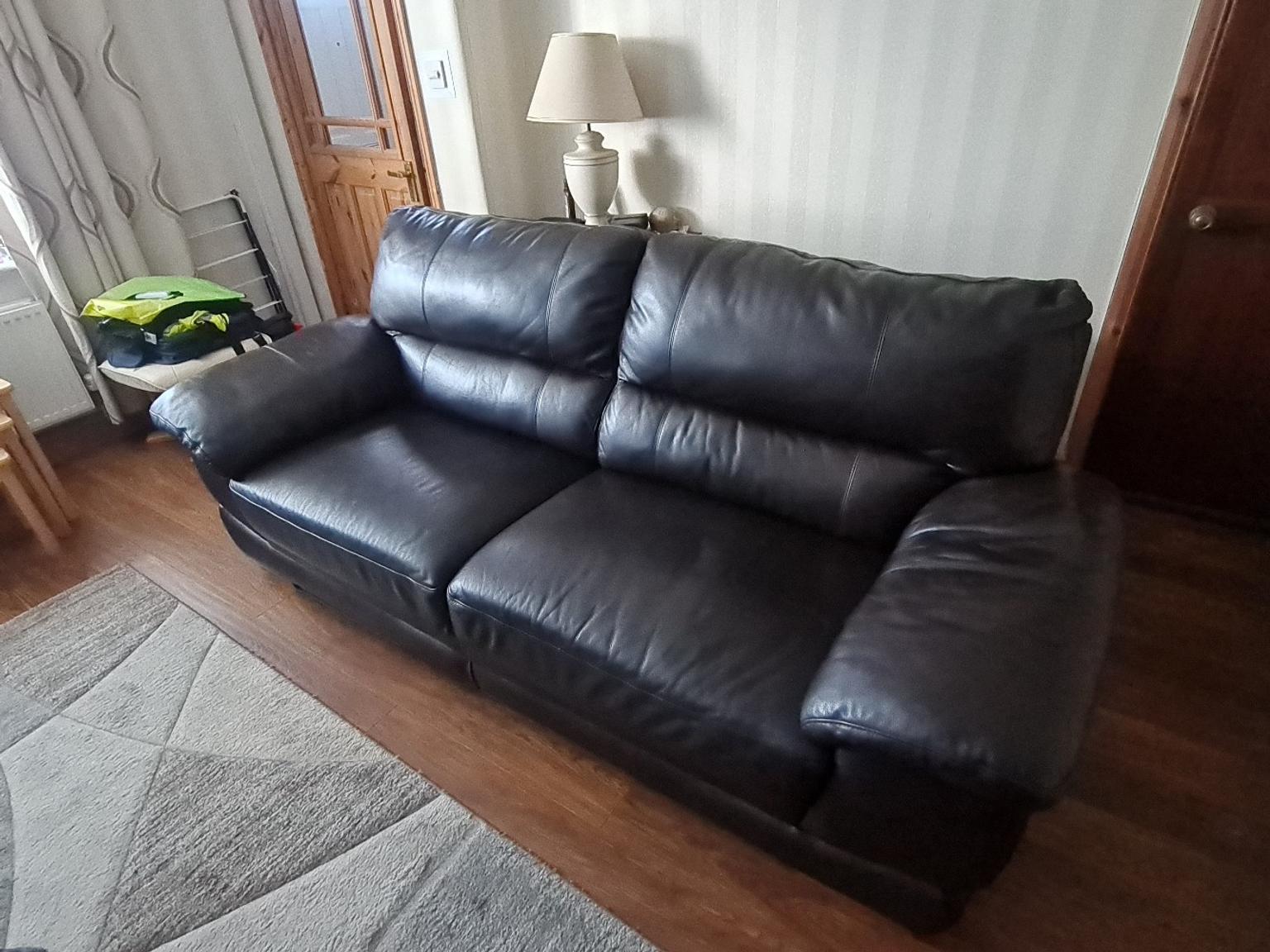 Dark brown leather couch in WA8 Hale for £150.00 for sale Shpock