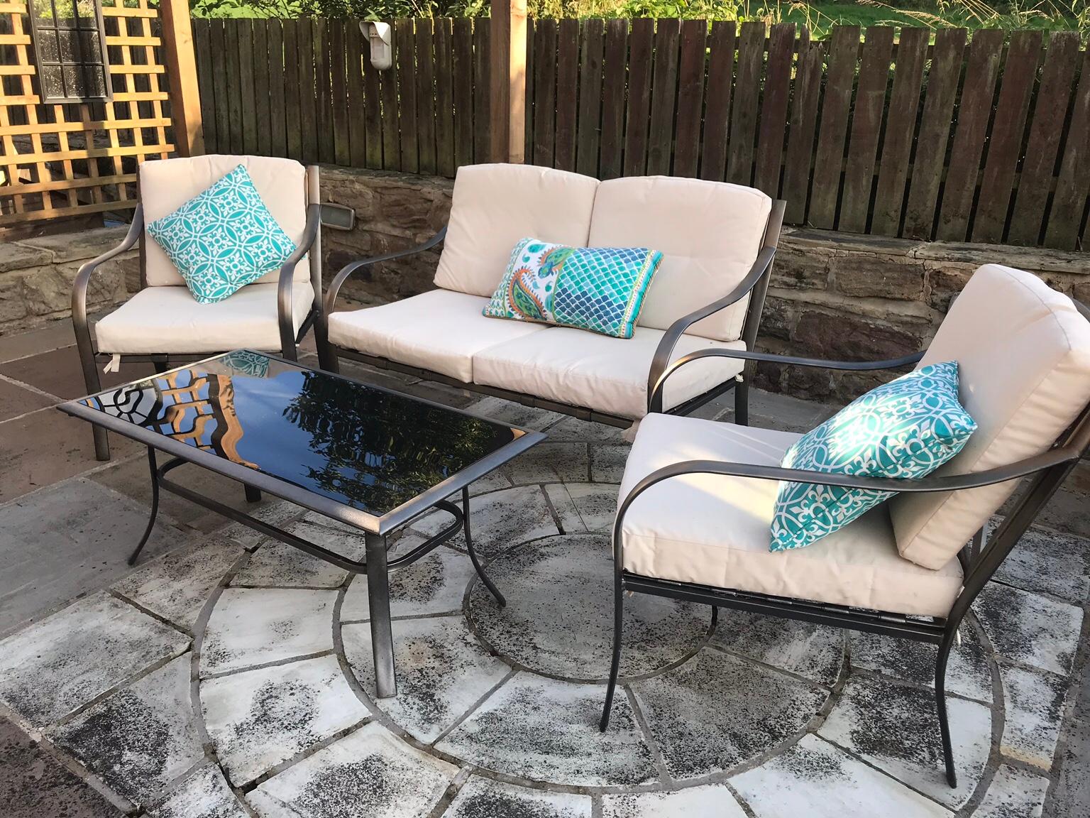 Outdoor furniture with cushions and table in WF4 Wakefield for Â£40.00