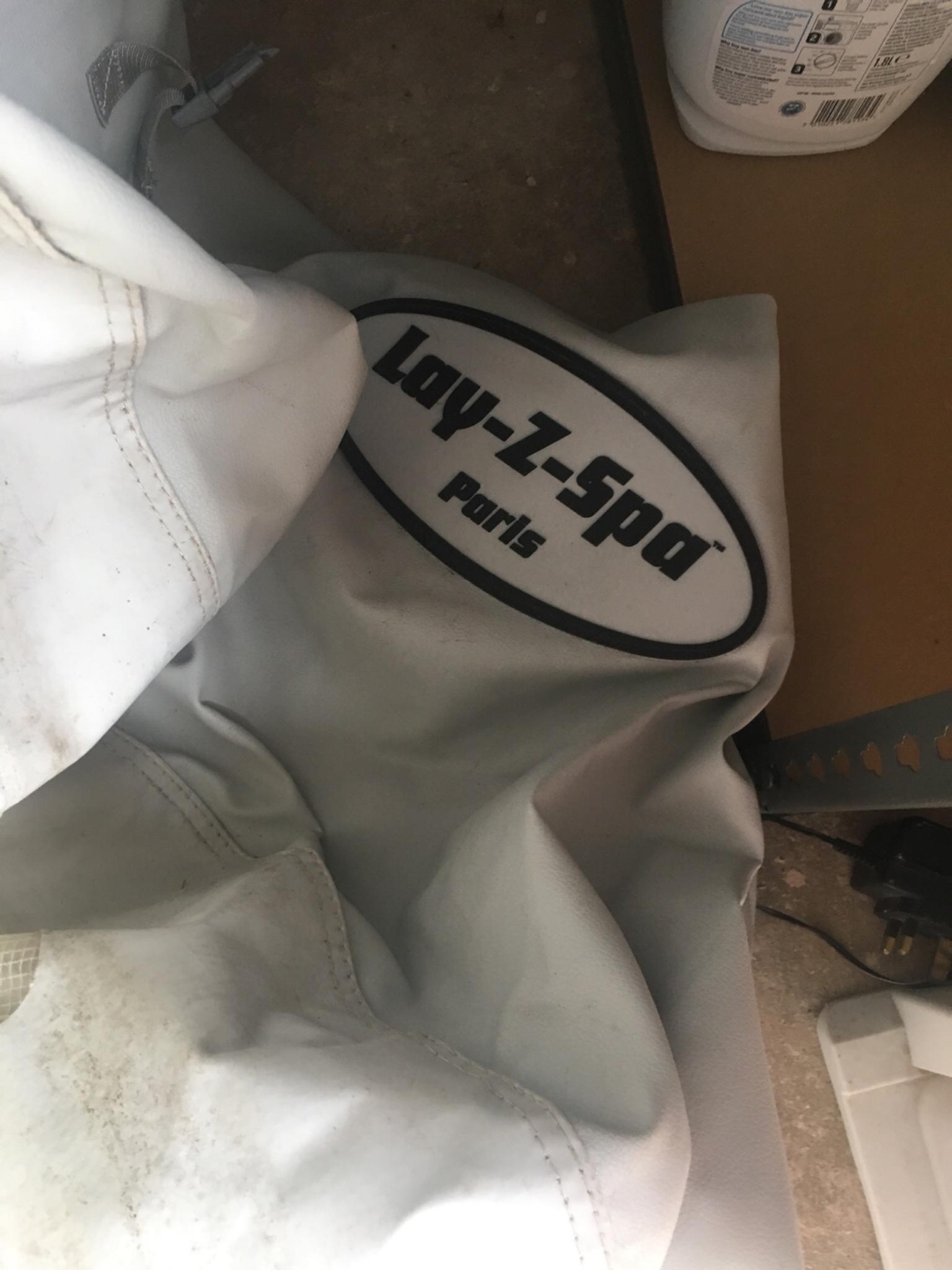 Paris lazy spa with pump outer liner & top in Heath