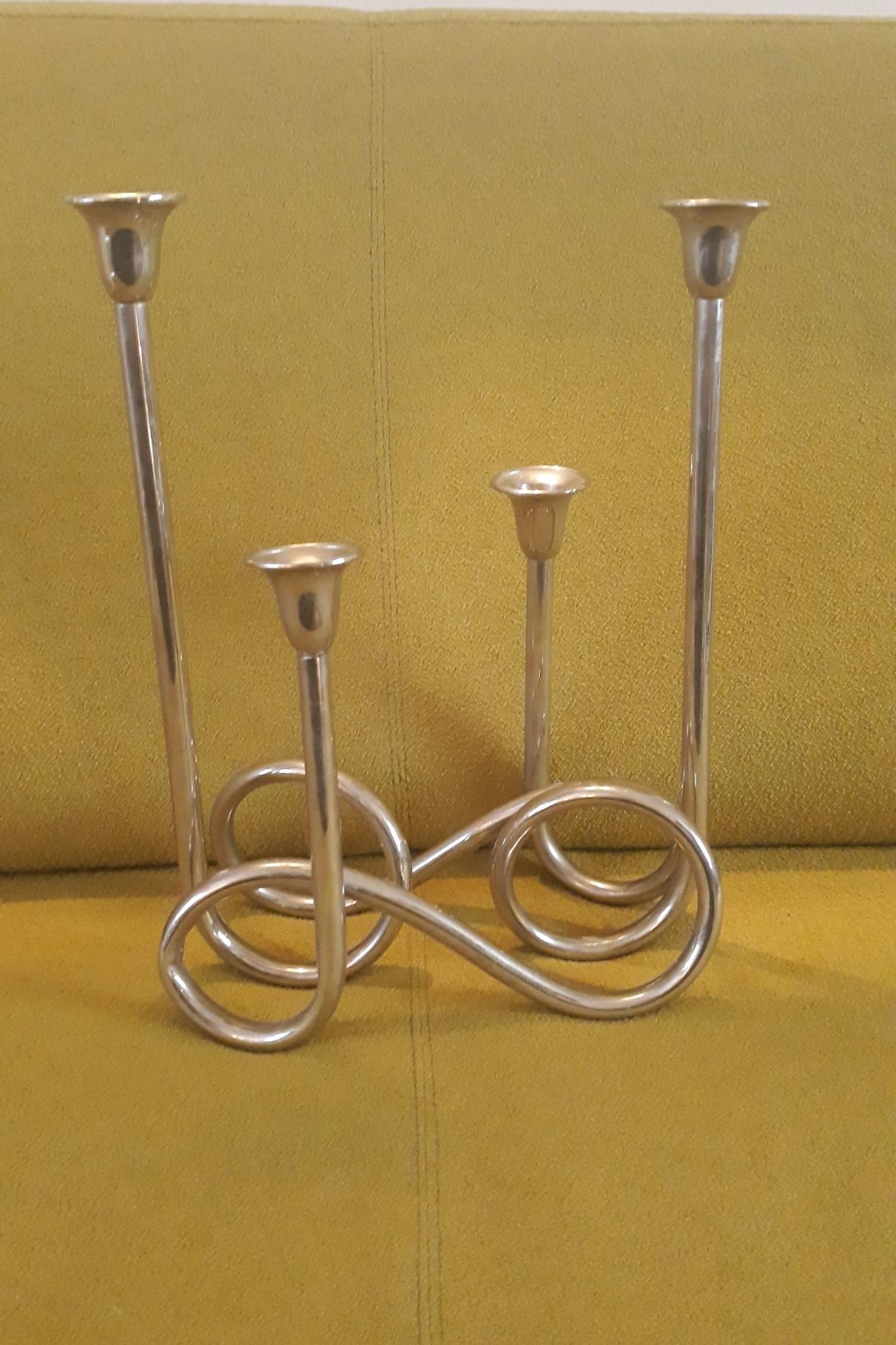 Quirky chrome candle sticks in CV9 North Warwickshire for £6.00 for
