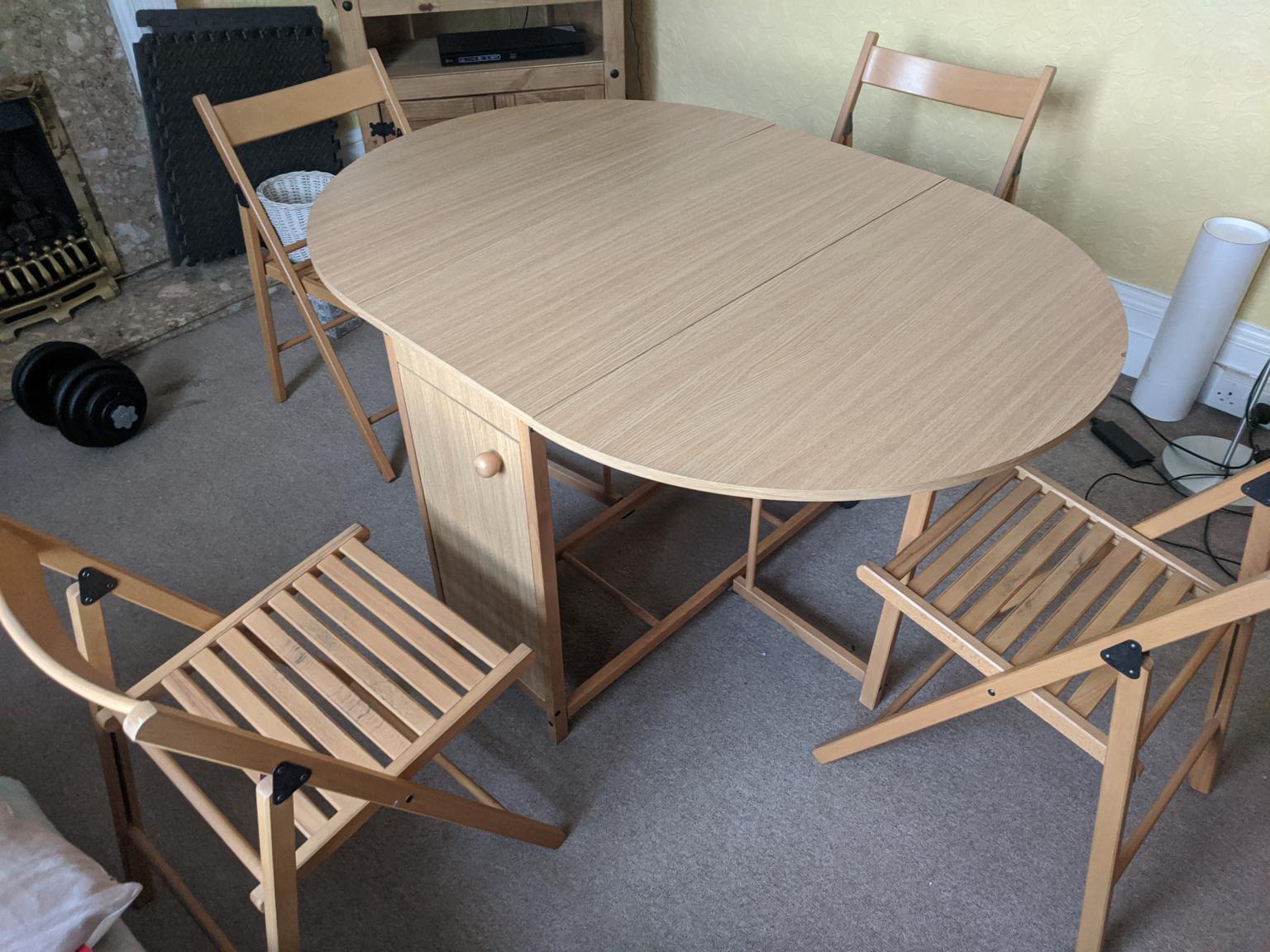 Argos wooden fold away table and 4 chairs in TW1 London for £70.00 for