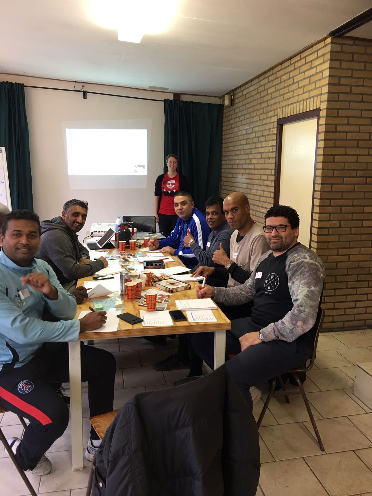 Technisch kader Rotterdam United rond cursus positief coachen met goed