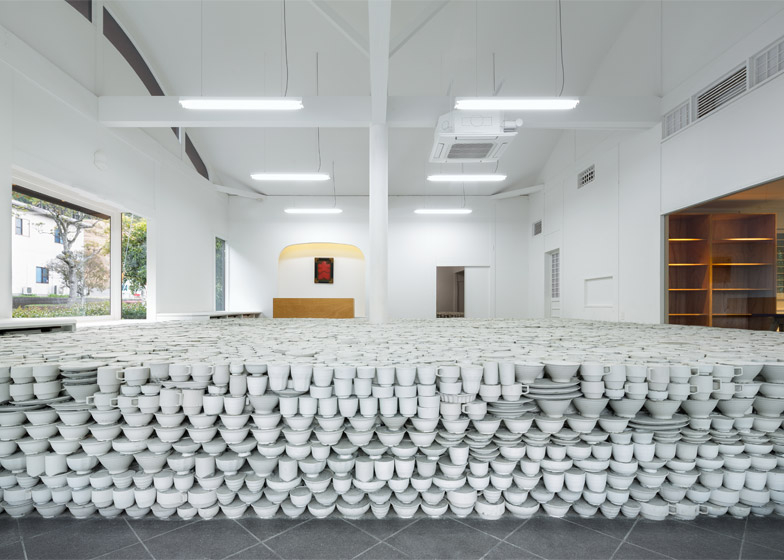 Stacked Ceramics Shop Floor Made from 25,000 Pieces of Pottery