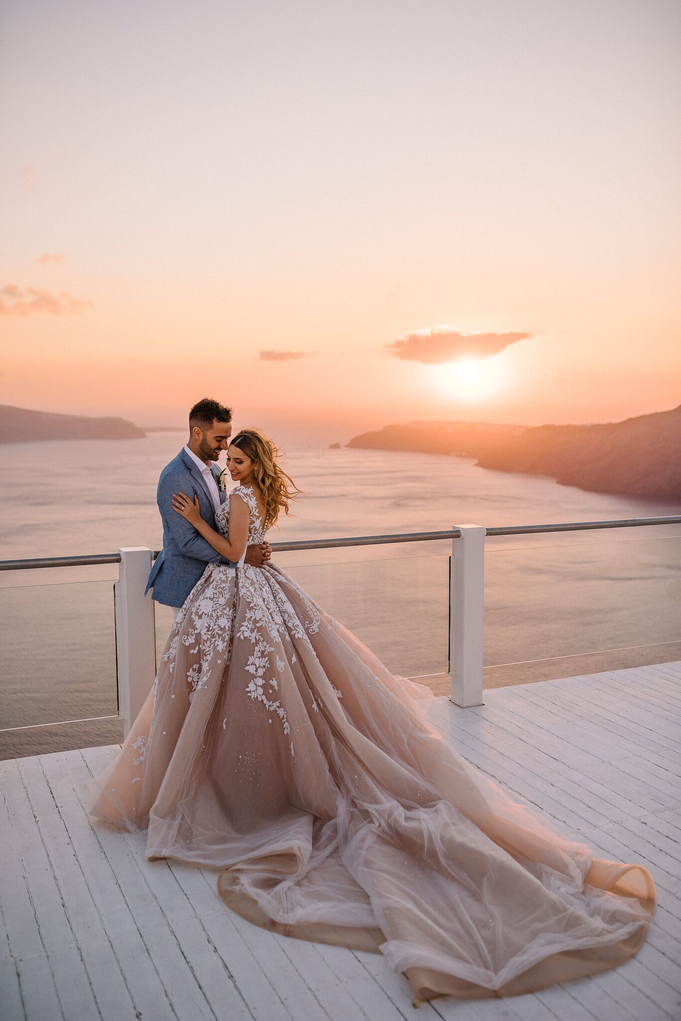 An AllWhite Wedding Set Against The Santorini Sunset Wedded Wonderland