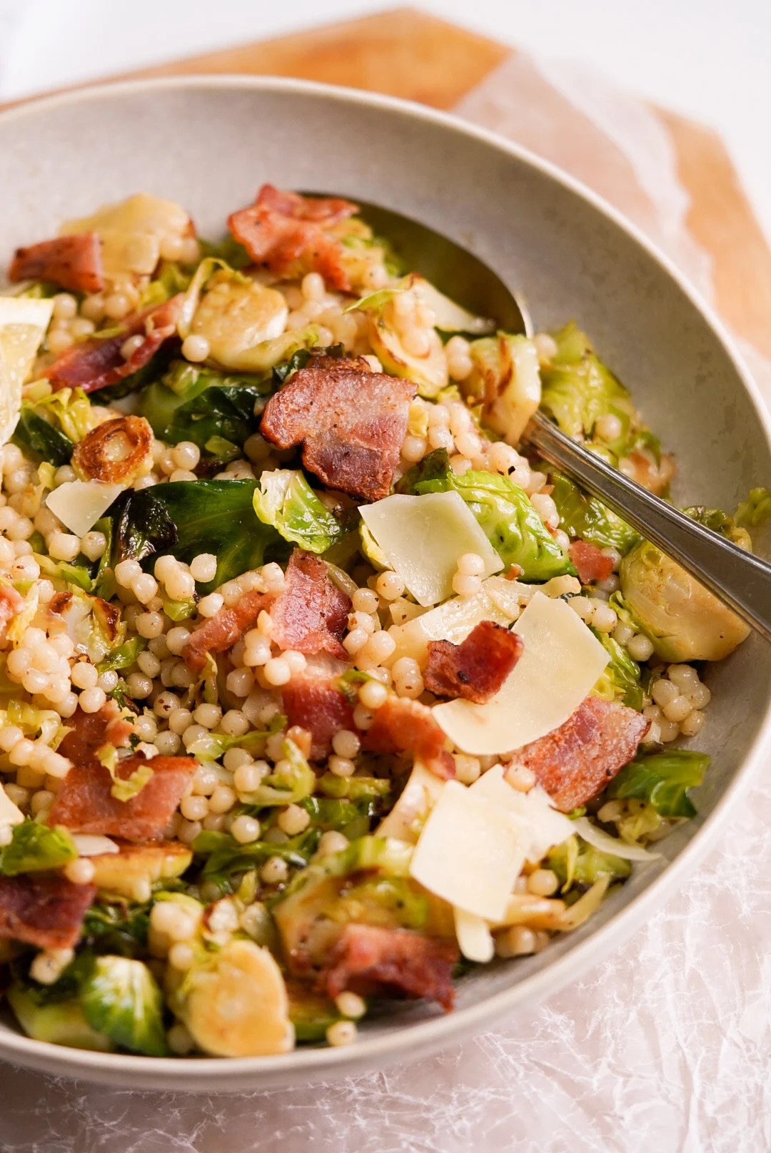 Warm Couscous & Brussels Sprout Salad Wellness by Kay