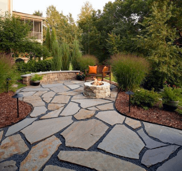Stone vs Paver Patio Wellspring Land Design