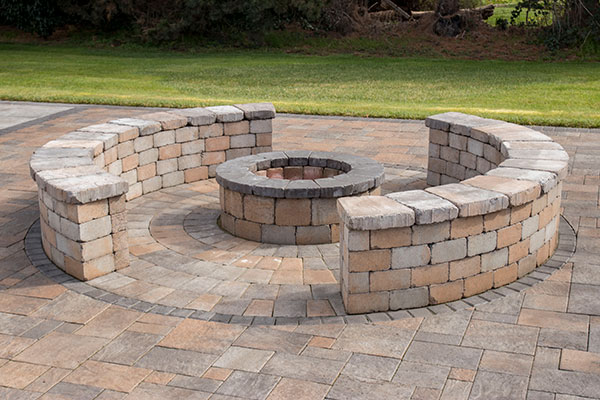 Add beads of construction adhesive to the bottom layer to bond everything in place. Fire Pit Wall Paulbabbitt Com