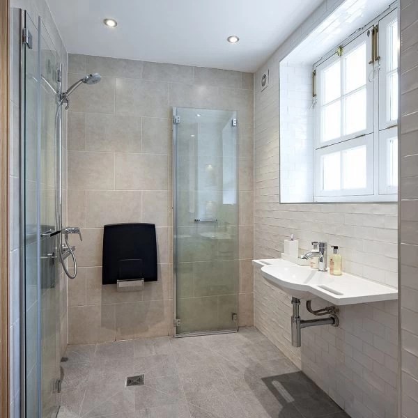 SHOWER FOR DISABLED PERSON Wetrooms Design Ltd