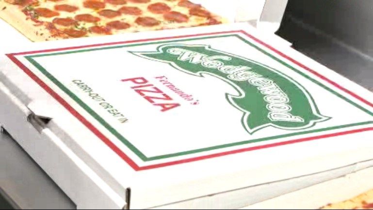 Boardman Wedgewood celebrating National Pizza Day by feeding those in
