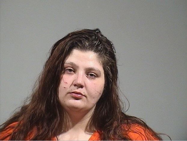 Warren woman accused of repeatedly beating woman with pipe, biting