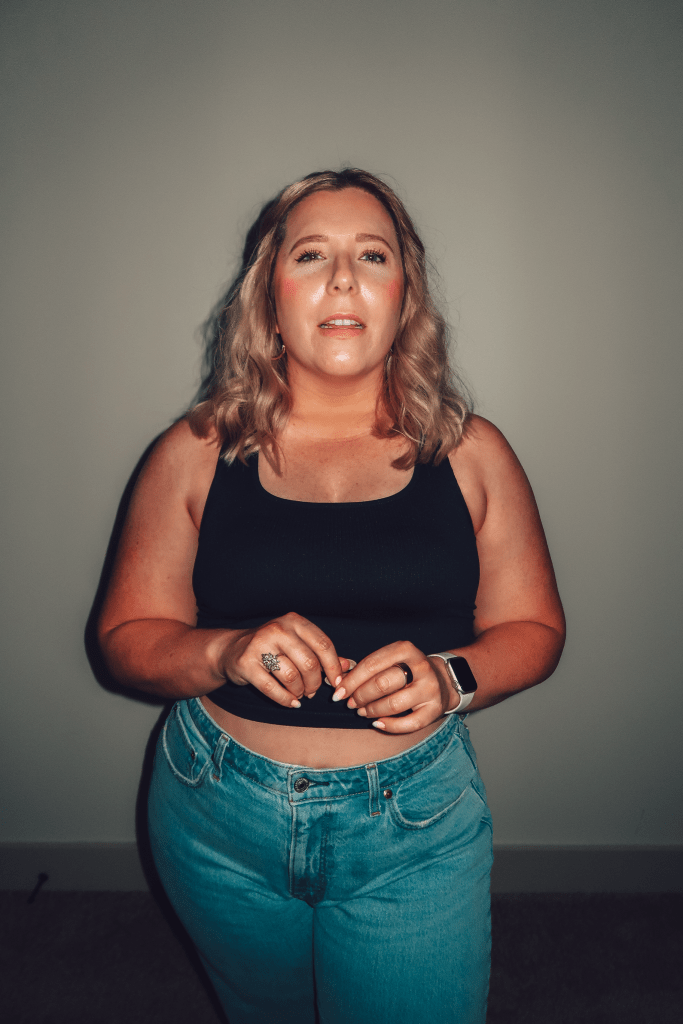 What Savvy Said Blogger Savannah Cyree shares How To Do The 75 Love Reset - in photo: woman wearing black cropped top and jeans